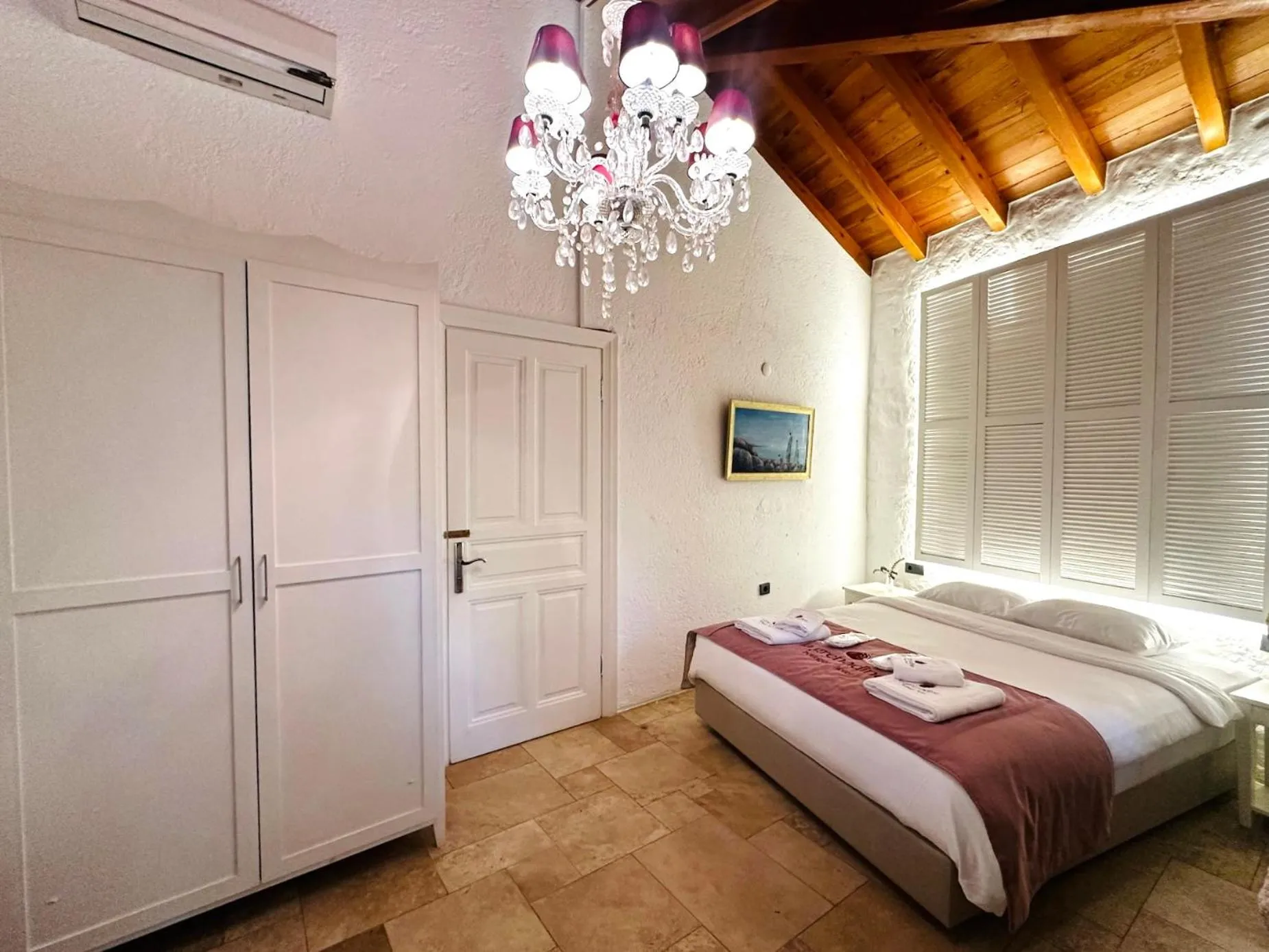 Bed in La Grenadine Hotel