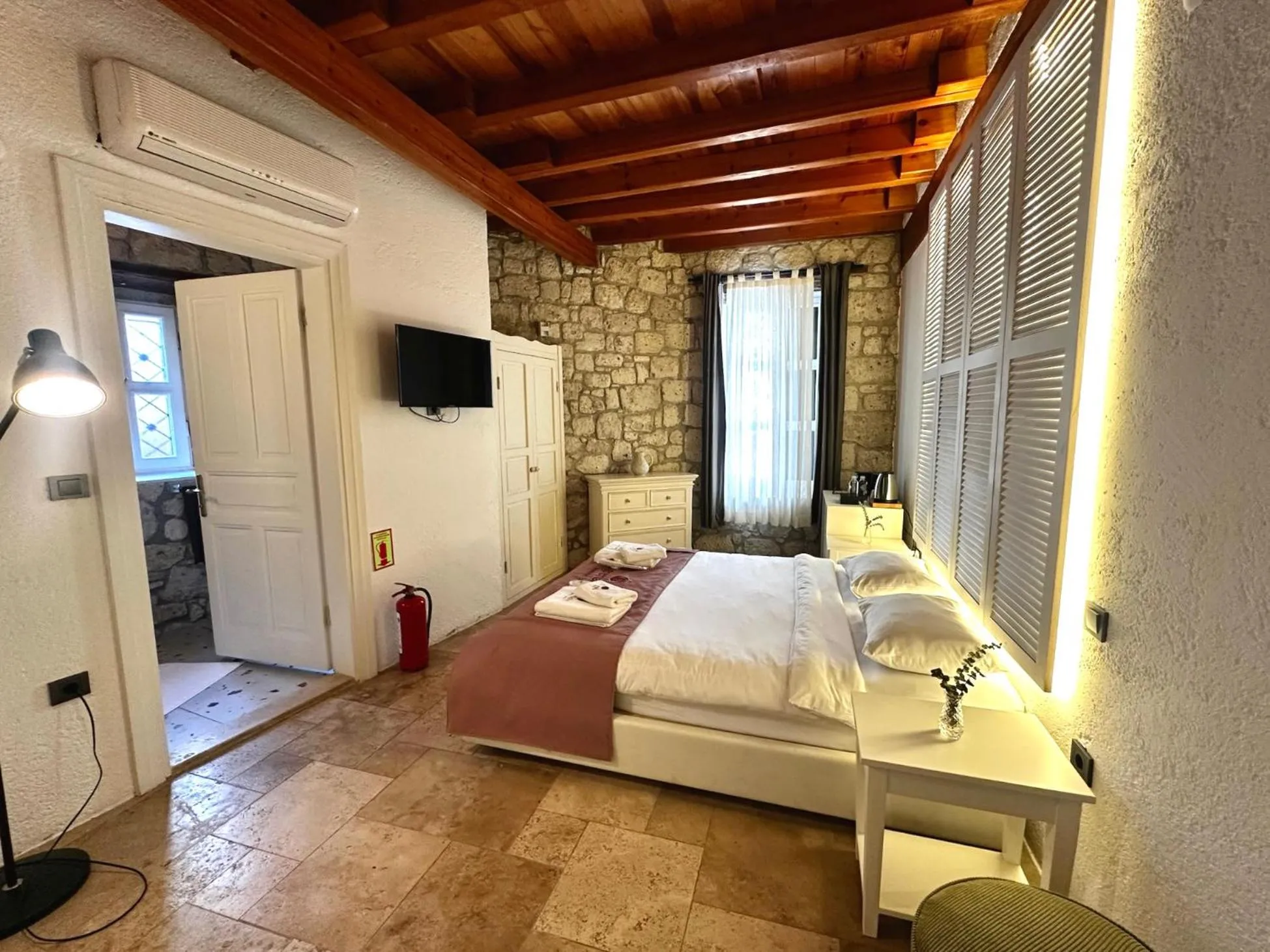 Bed in La Grenadine Hotel
