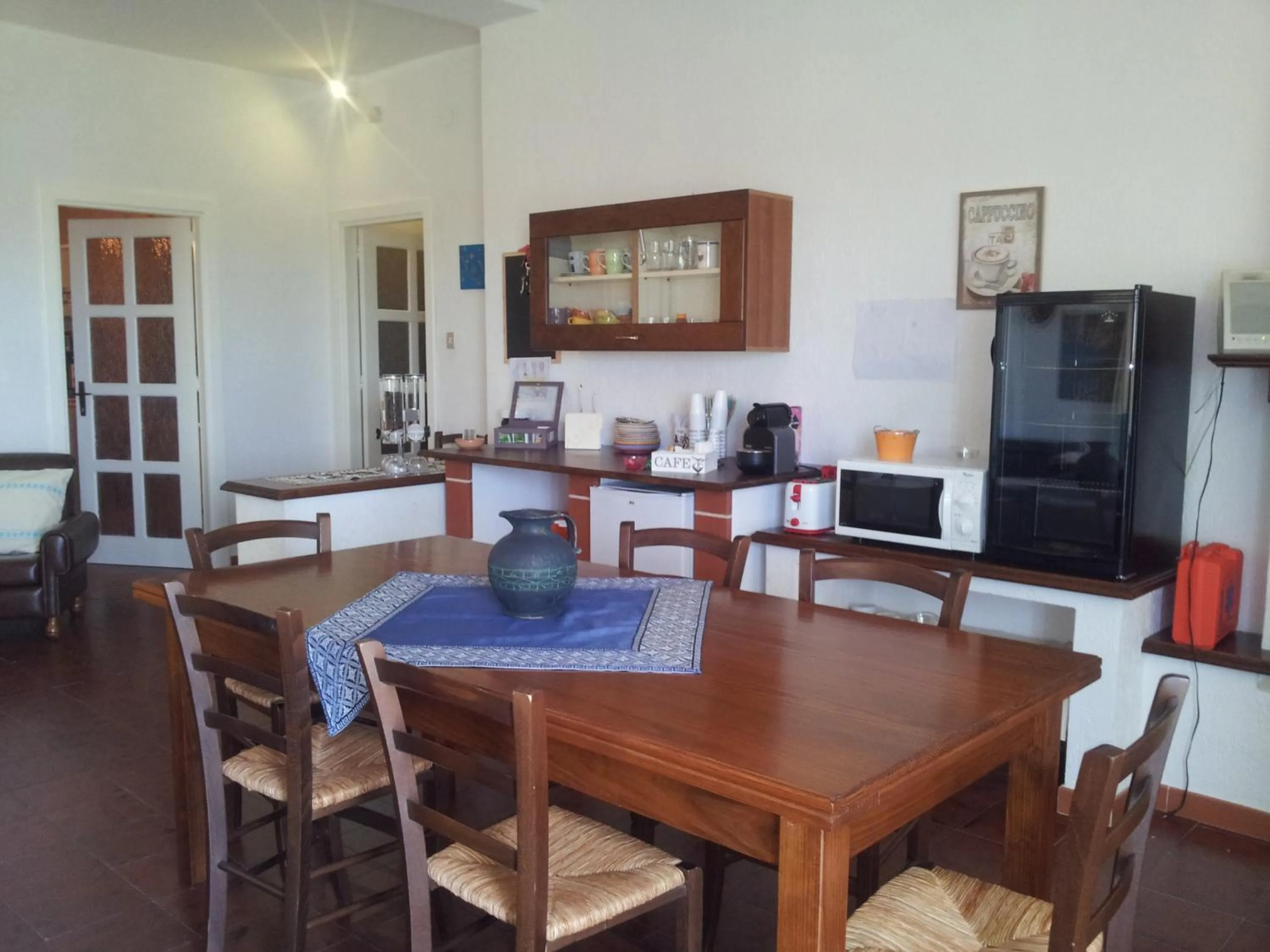 Communal lounge/ TV room in Al Sole Di Pula