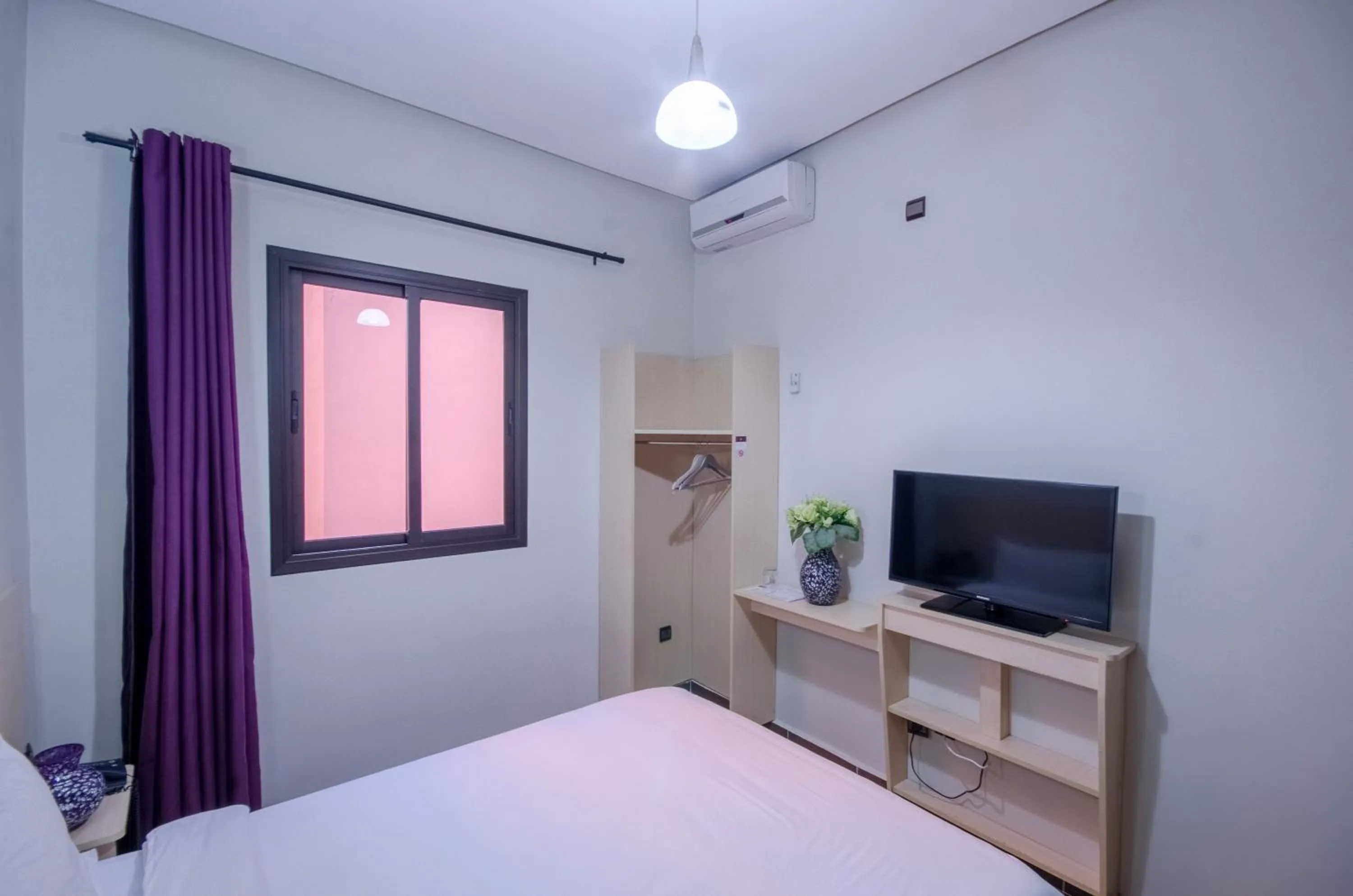 TV and multimedia, Bed in INOU Hotel Aourir