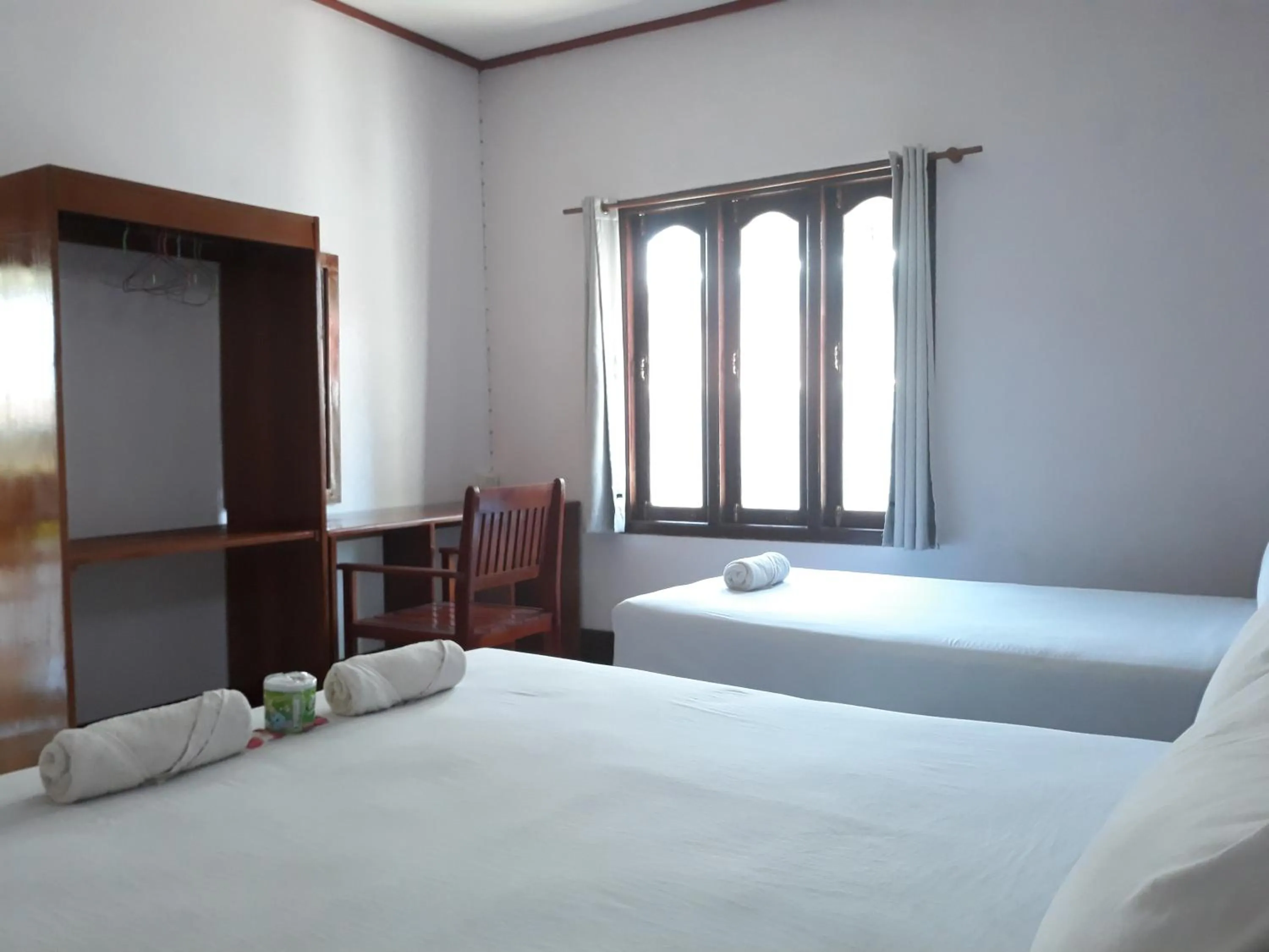 Bed in Mama Leurth Sunset Guesthouse