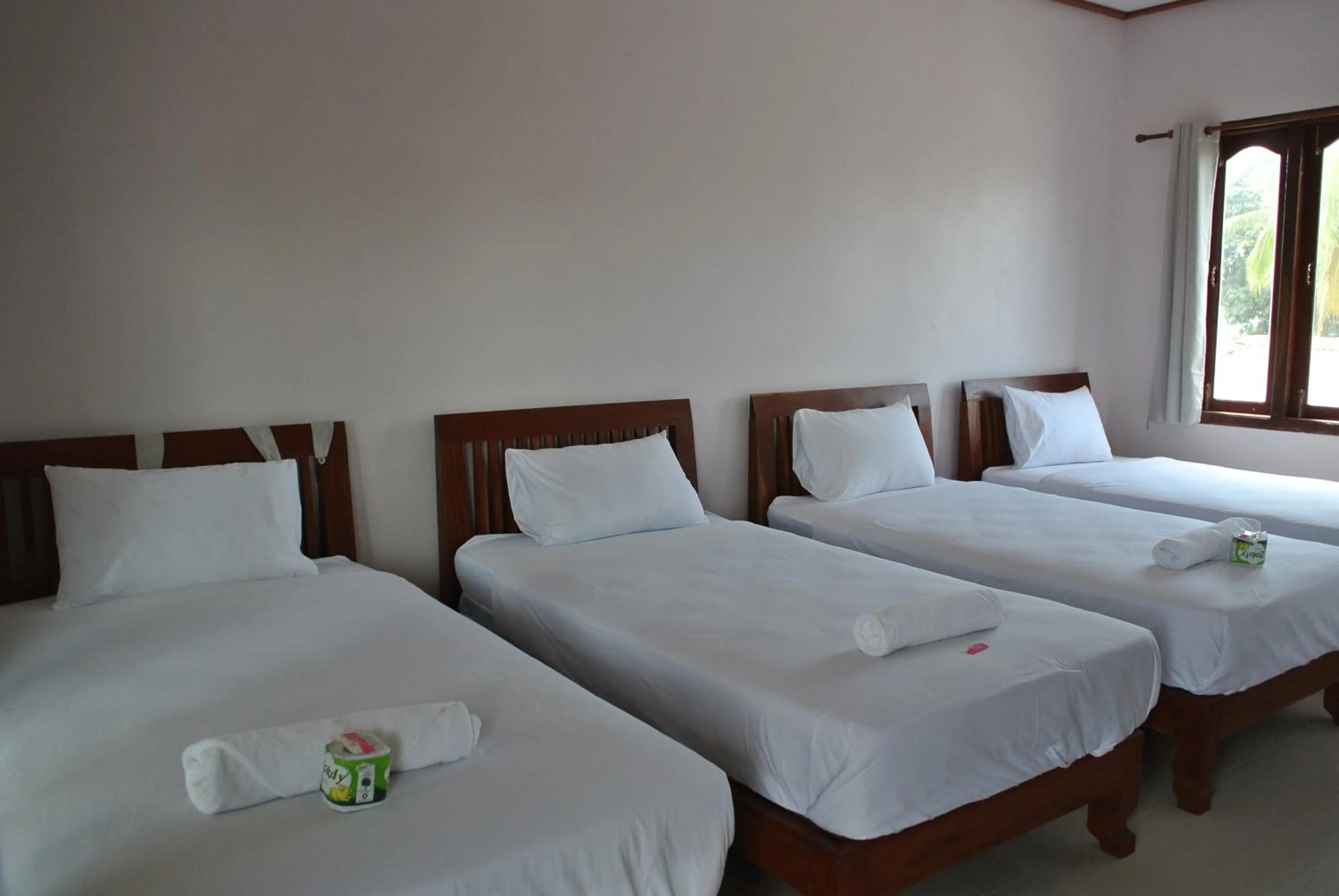 Bed in Mama Leurth Sunset Guesthouse