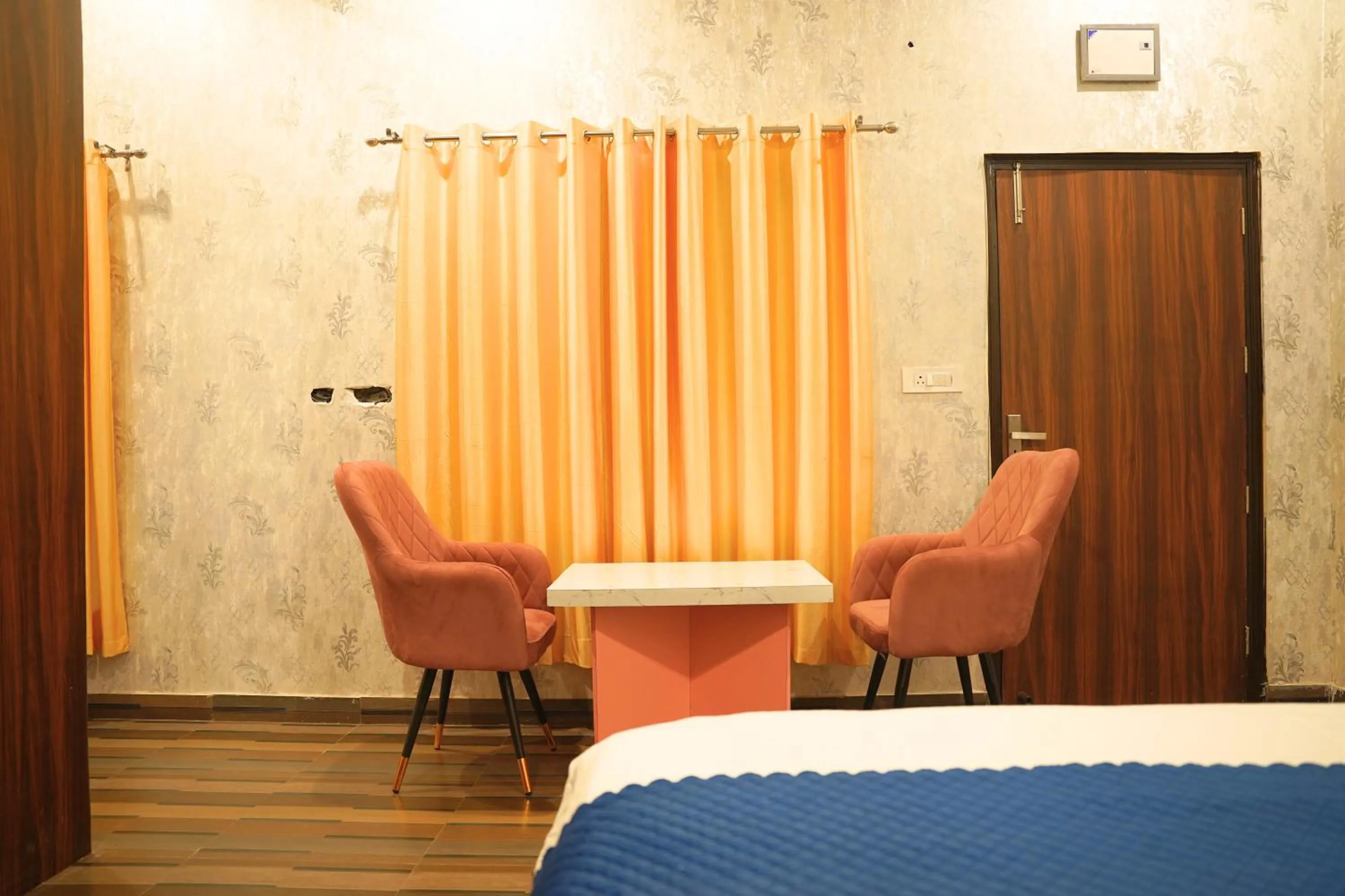 Seating area in Hotel HSR Residency