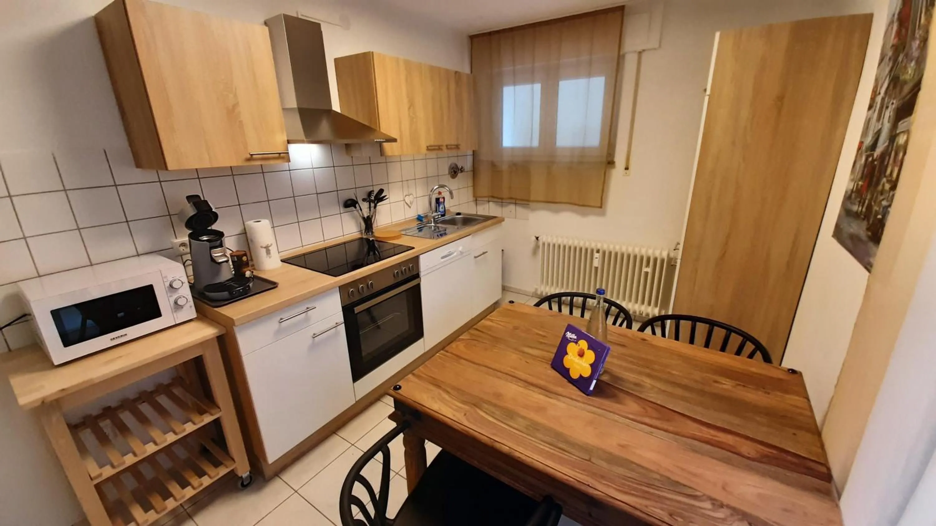 Kitchen or kitchenette in Gästewohnungen Enztal