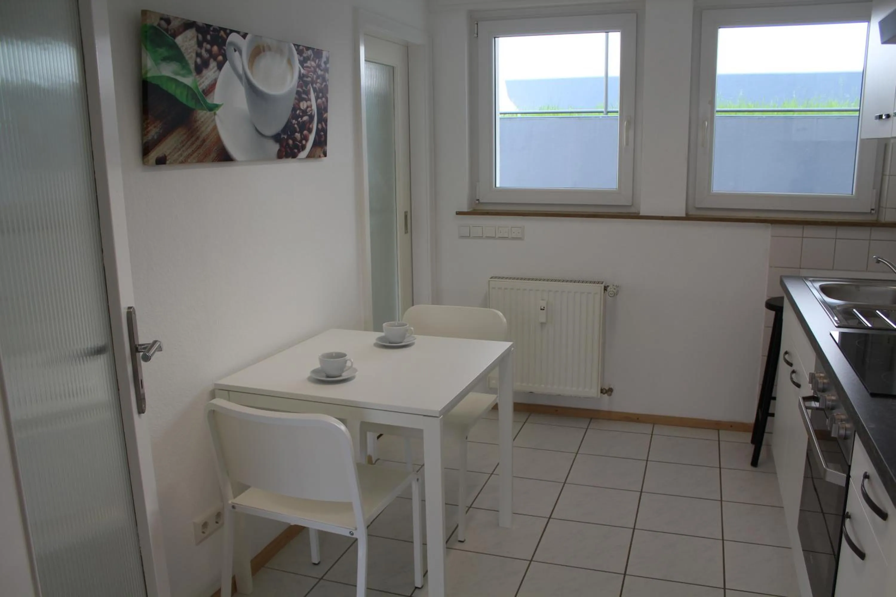 Kitchen or kitchenette in Gästewohnungen Enztal