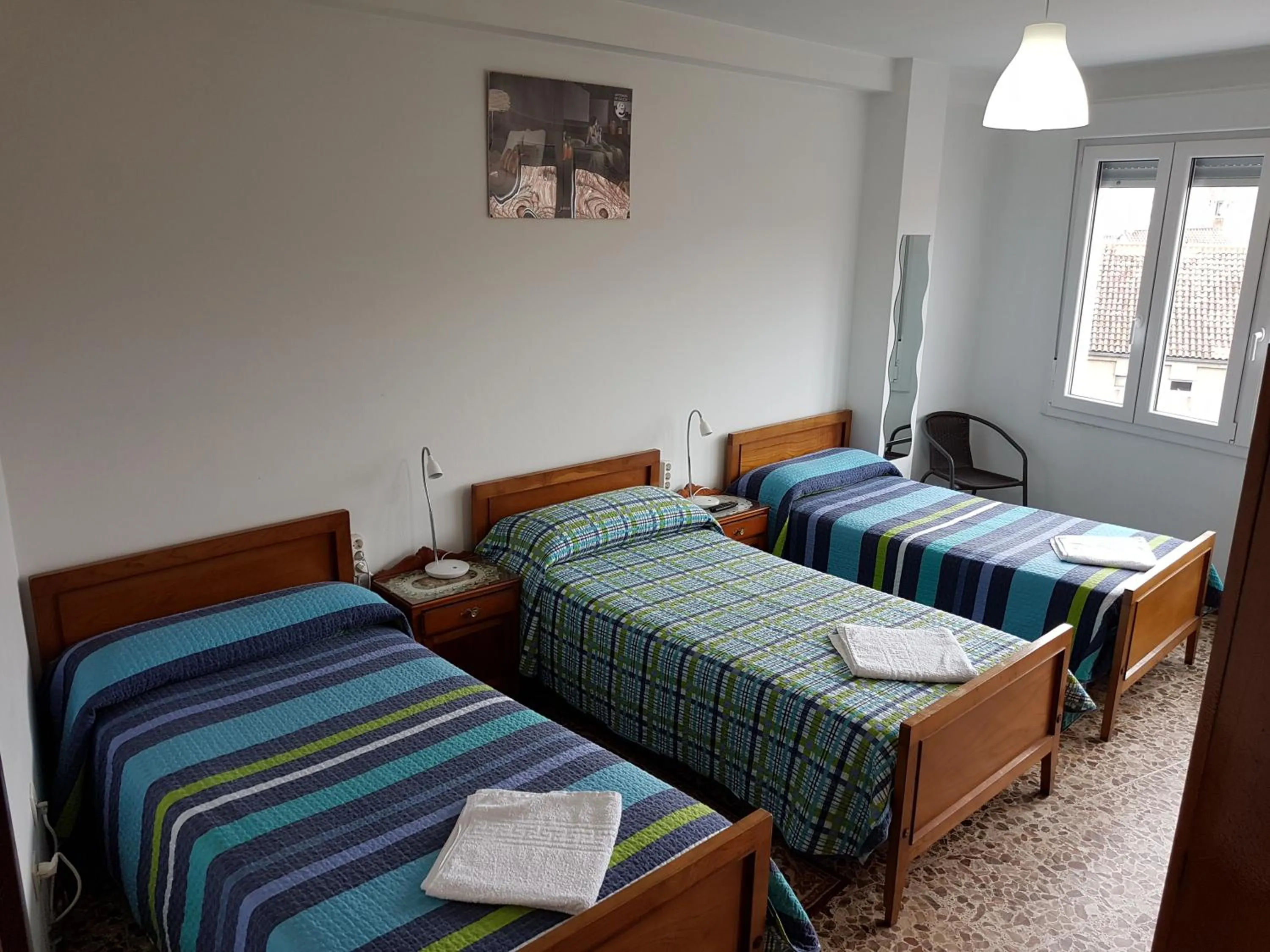 Photo of the whole room, Bed in Hostal Costa Azul