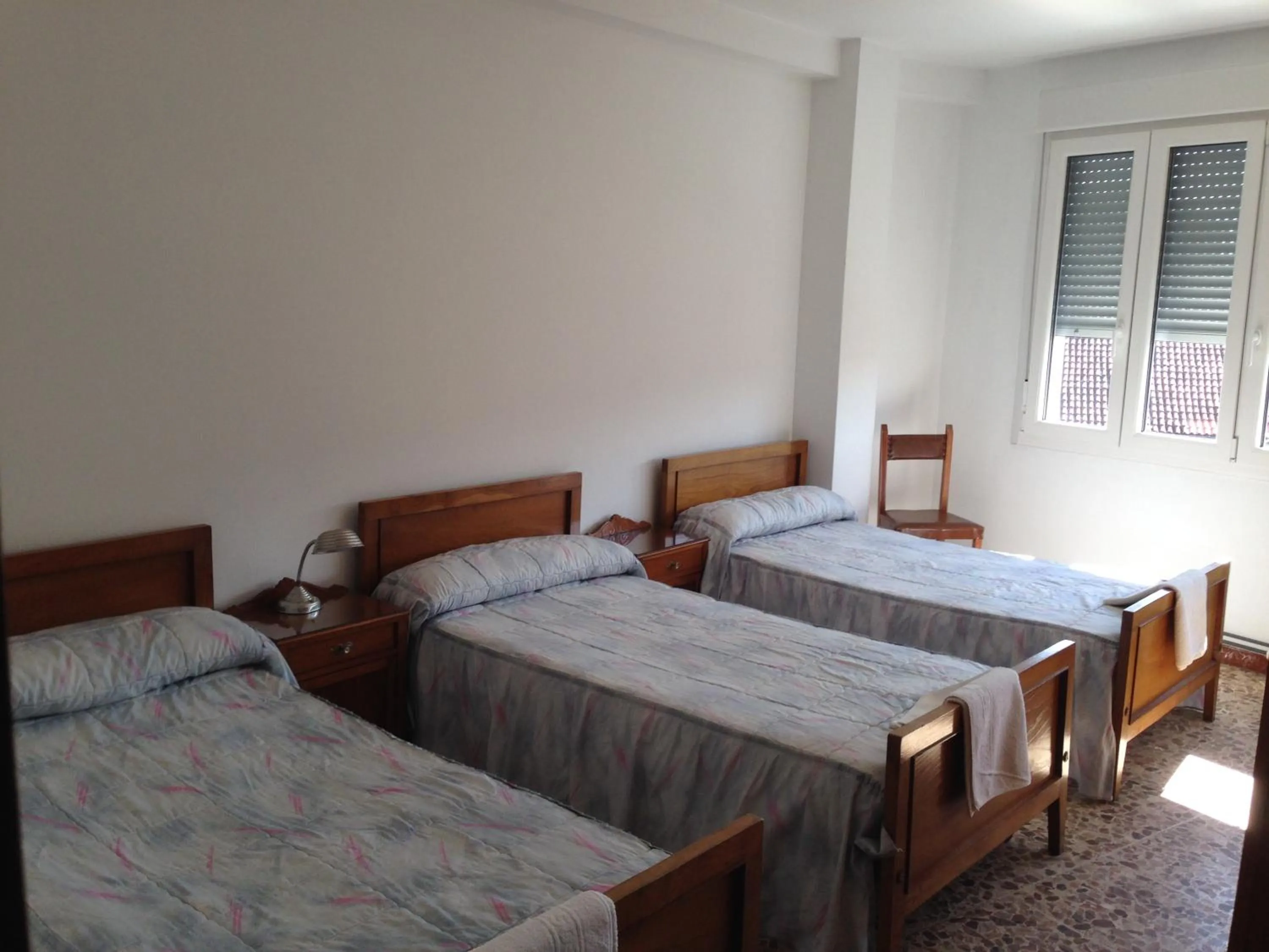 Photo of the whole room, Bed in Hostal Costa Azul