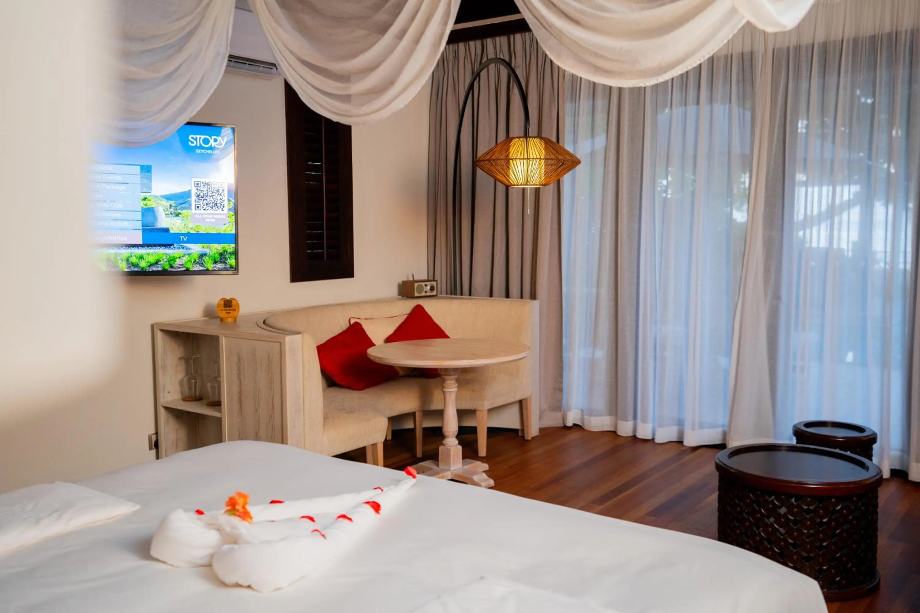 Seating area, Bed in STORY Seychelles