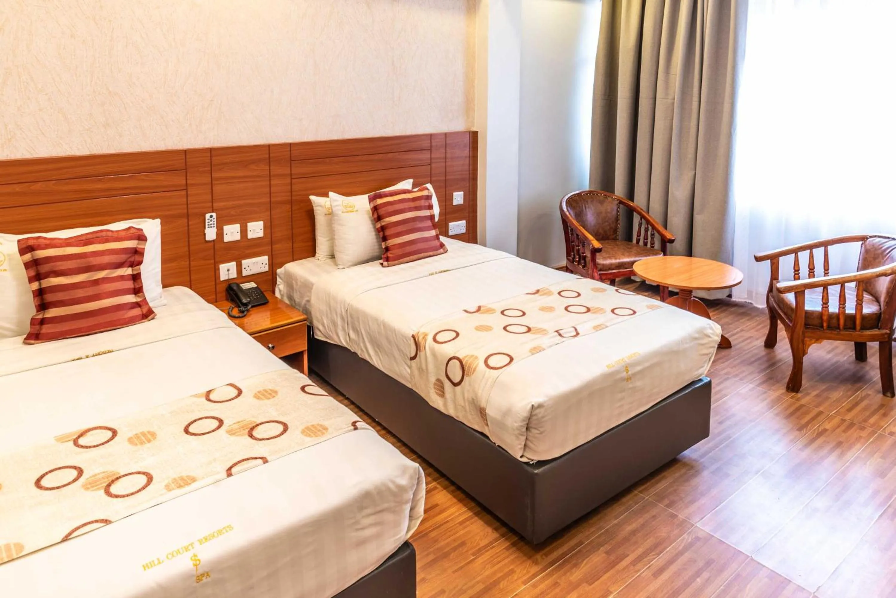 Bed in Hillcourt Resort and Spa