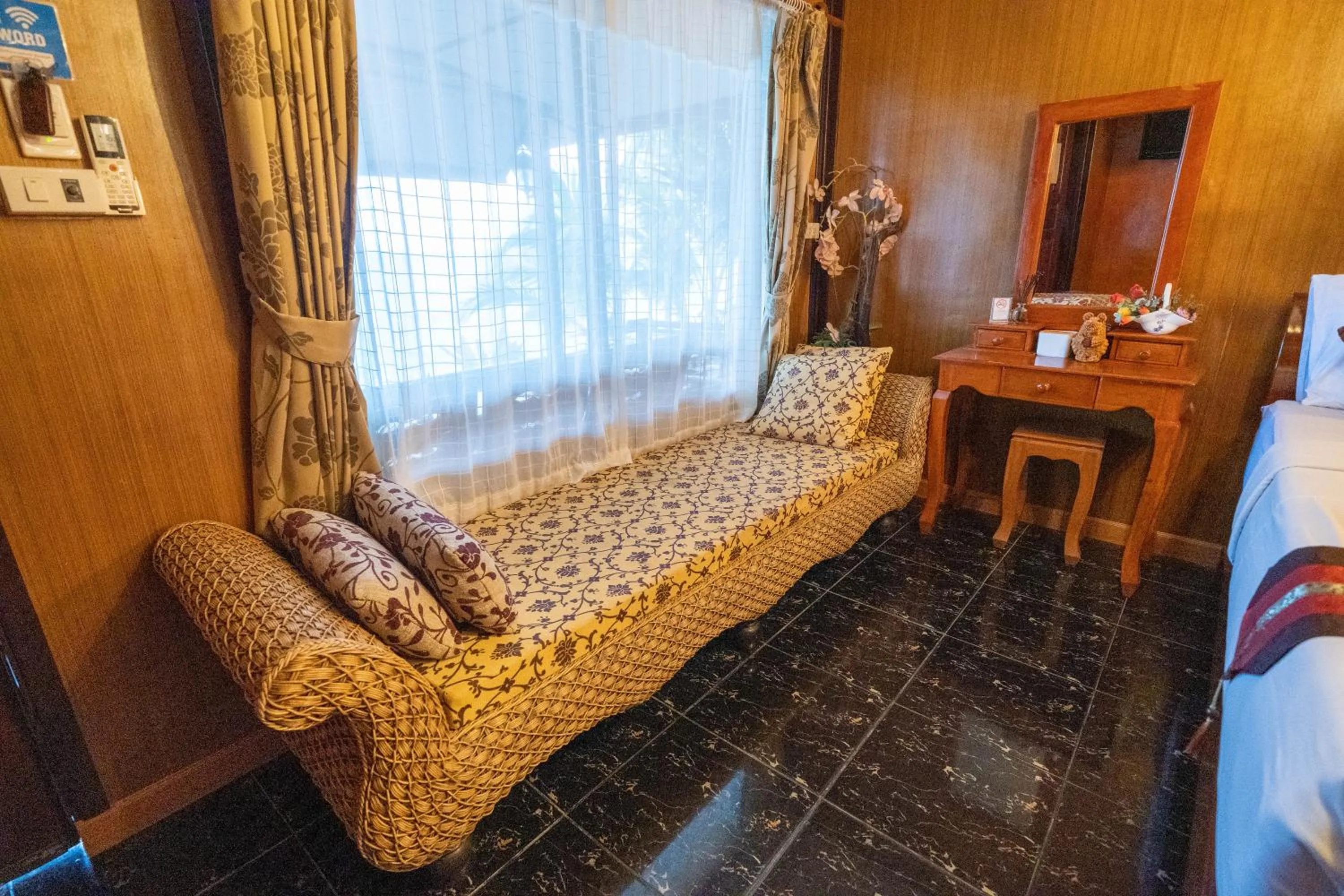 Seating area, Bed in Tongta Phaview Resort