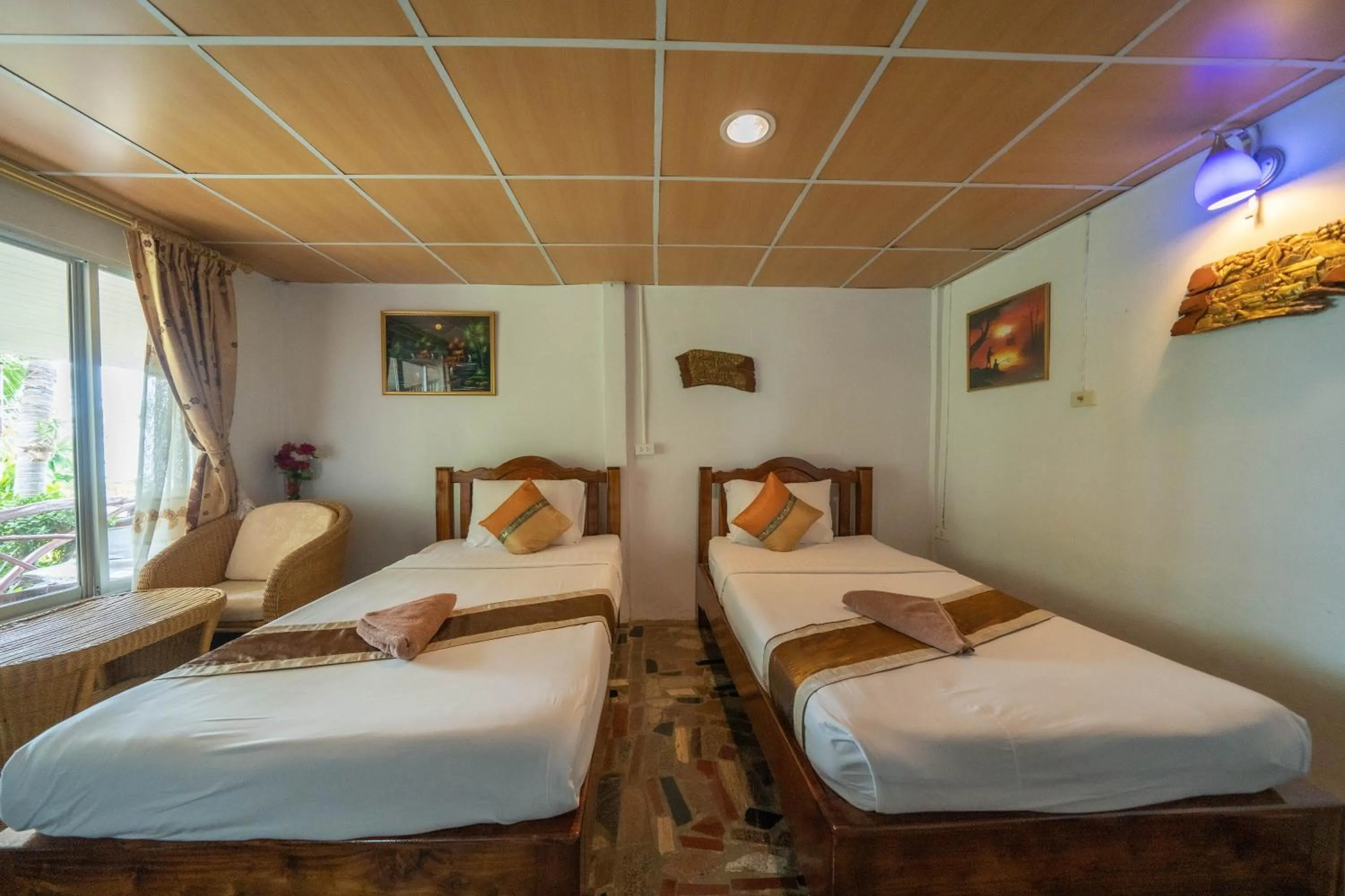 Bed in Tongta Phaview Resort