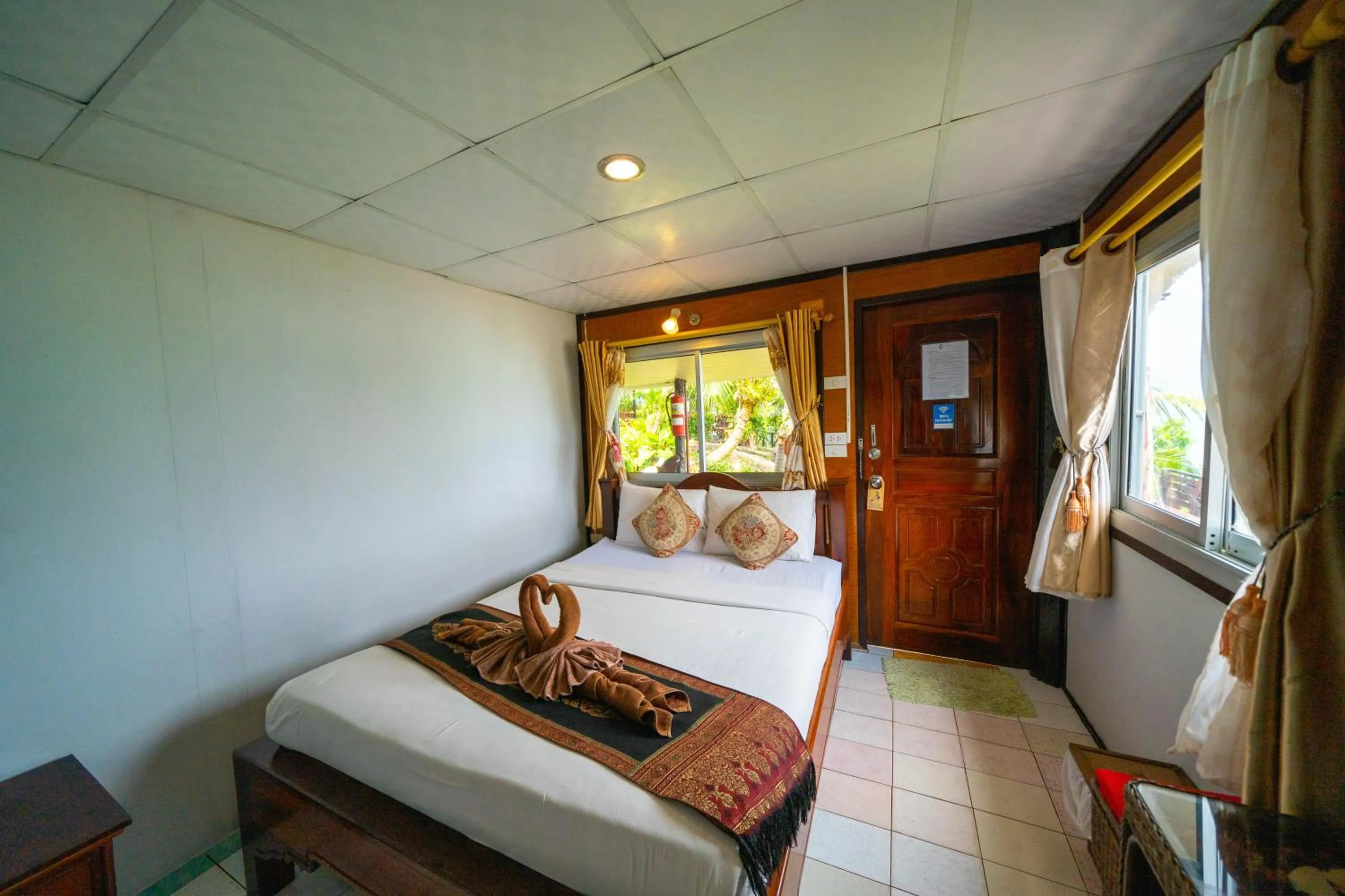 Bed in Tongta Phaview Resort