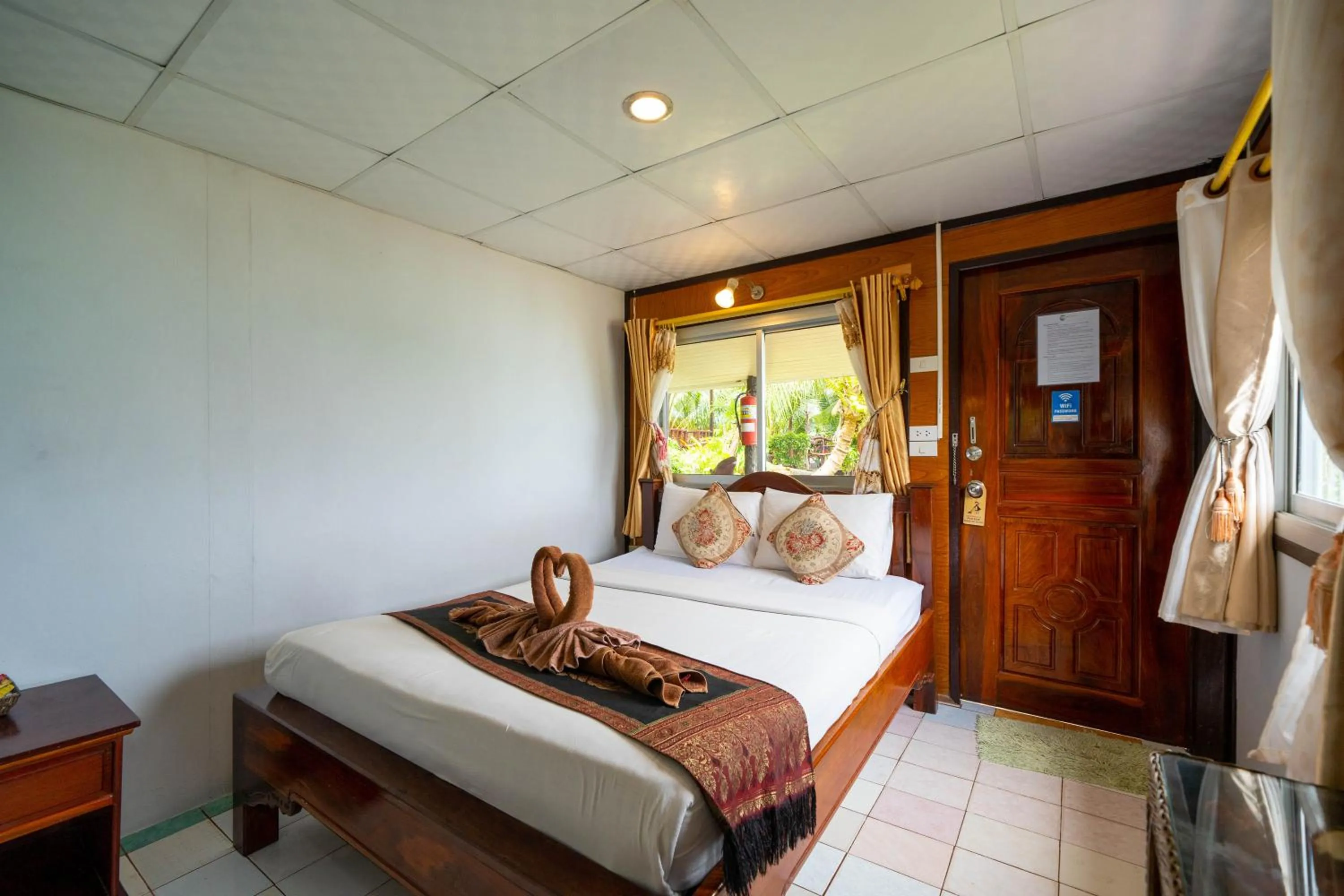 Bed in Tongta Phaview Resort