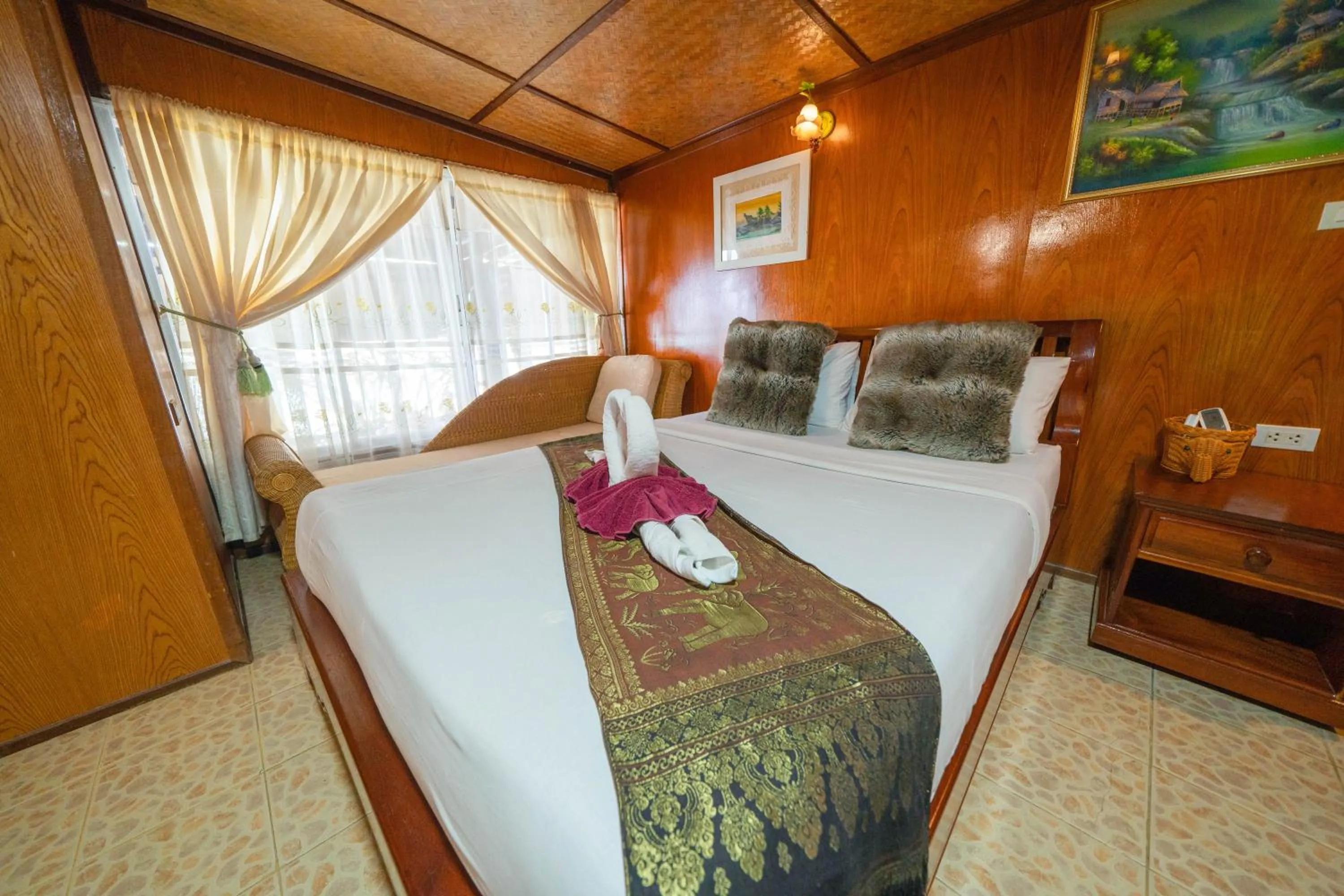 Bed in Tongta Phaview Resort