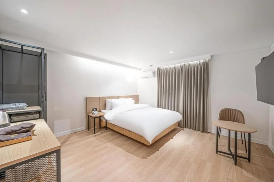 Bed in Brown Dot Hotel South Gumi