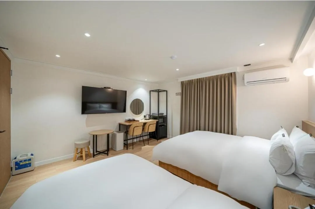 Bed in Brown Dot Hotel South Gumi