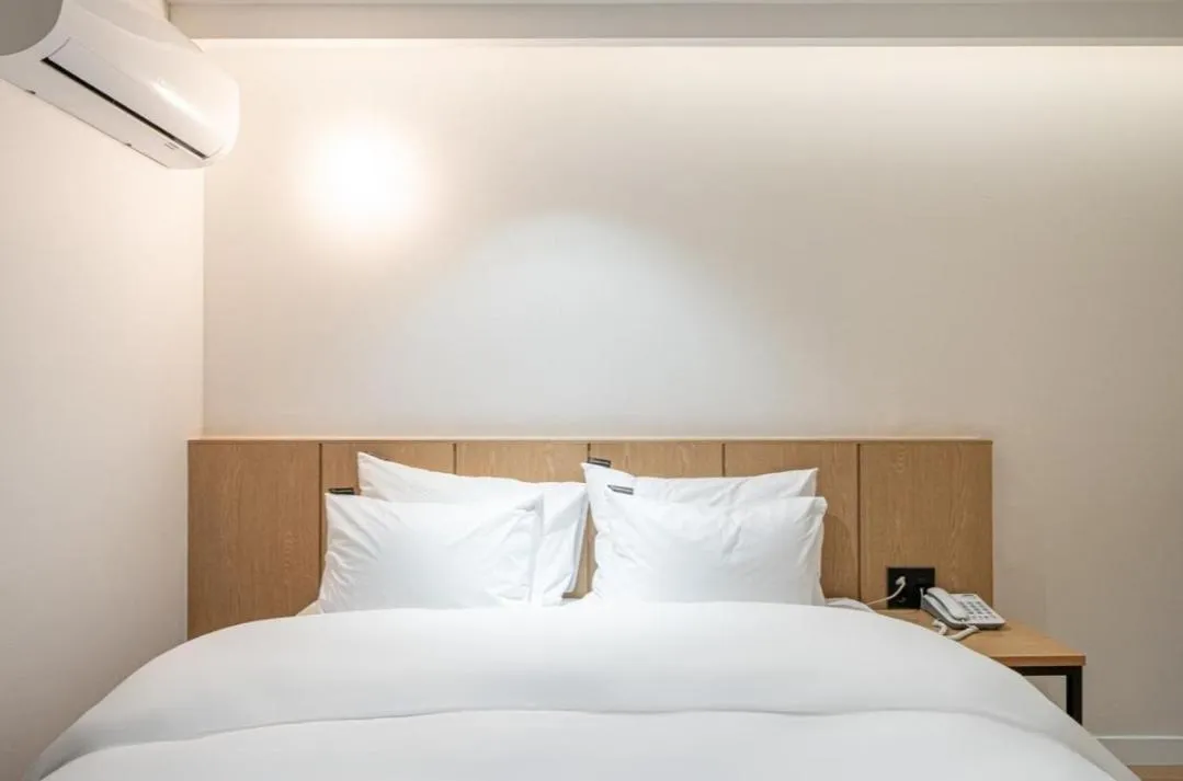 Bed in Brown Dot Hotel South Gumi