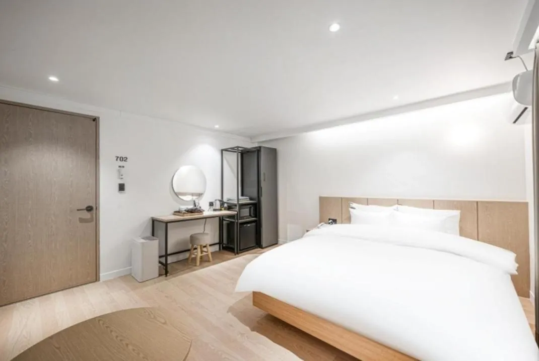 Bed in Brown Dot Hotel South Gumi