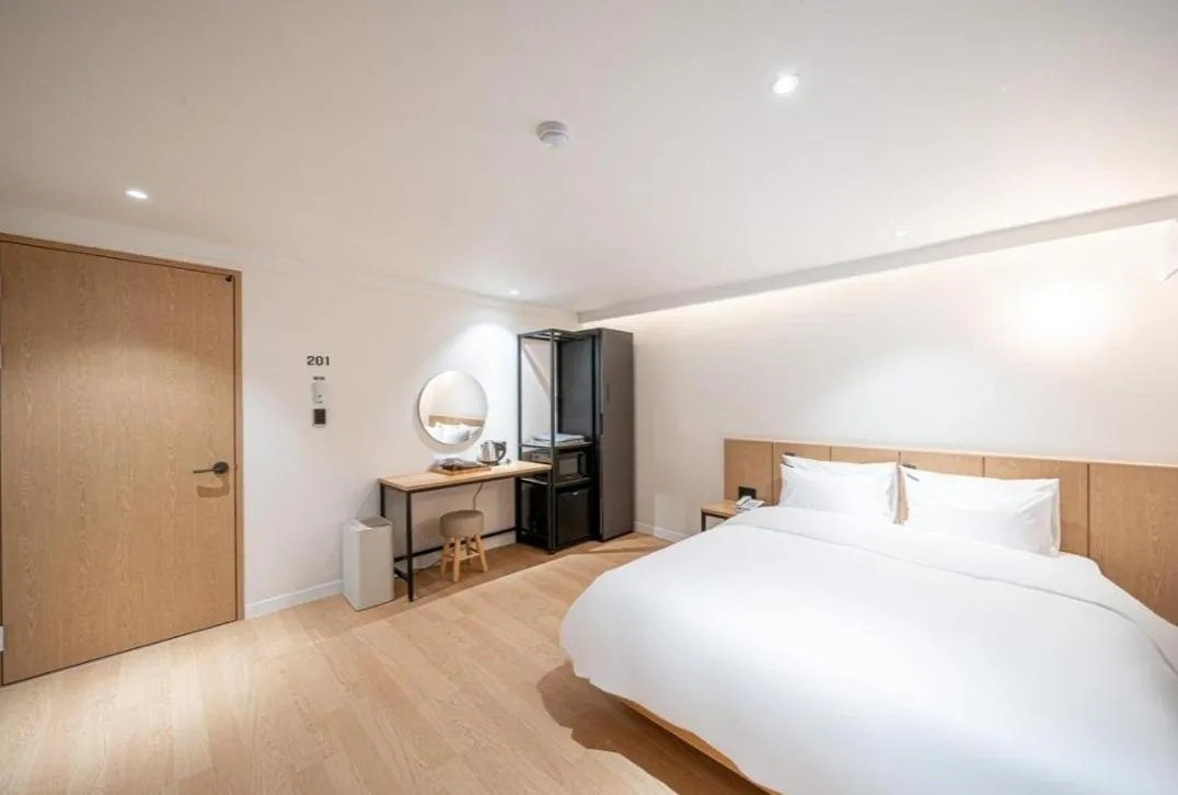 Bed in Brown Dot Hotel South Gumi