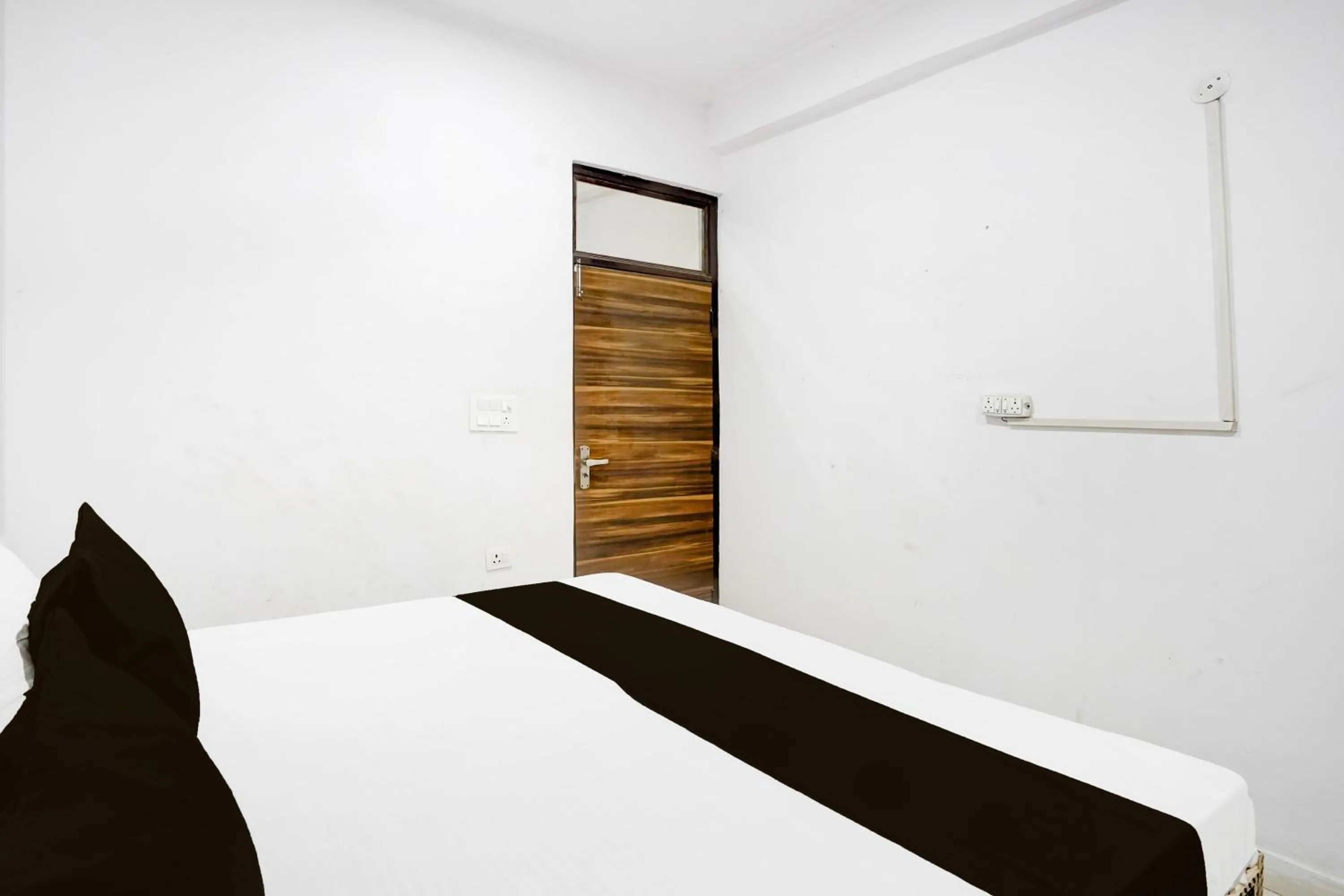 Bedroom in Hotel O by OYO IC Tower