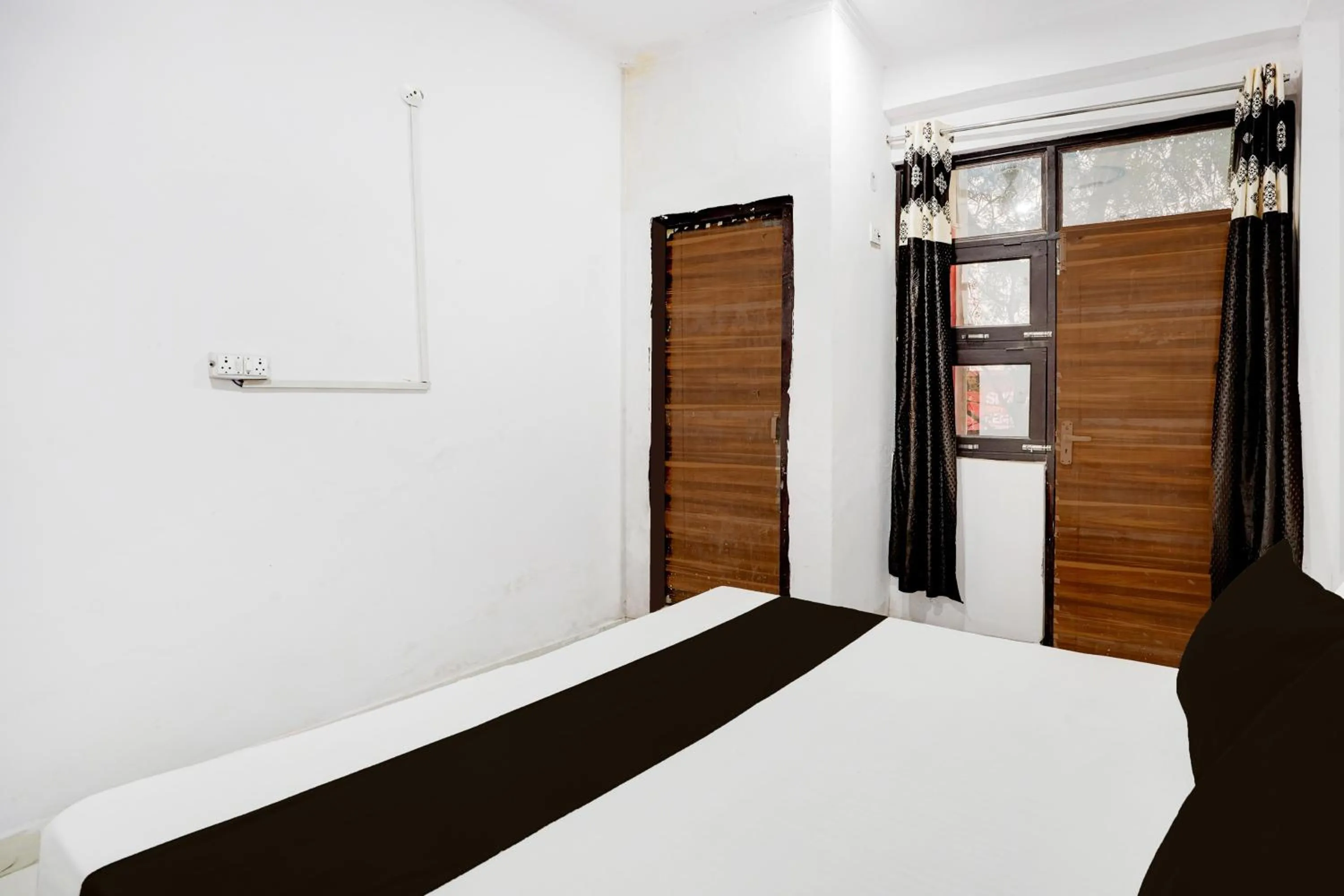 Bedroom in Hotel O by OYO IC Tower