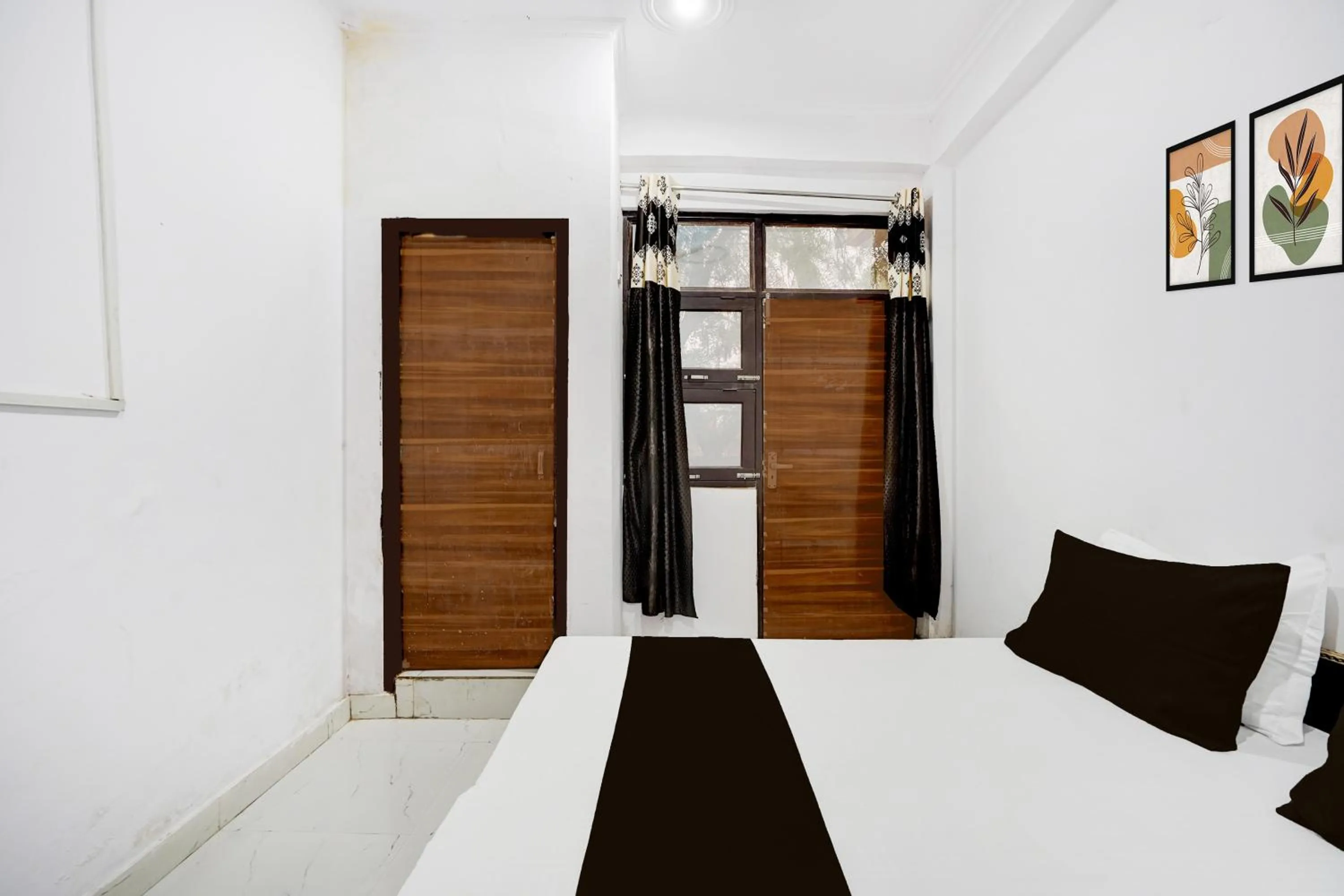 Bedroom in Hotel O by OYO IC Tower