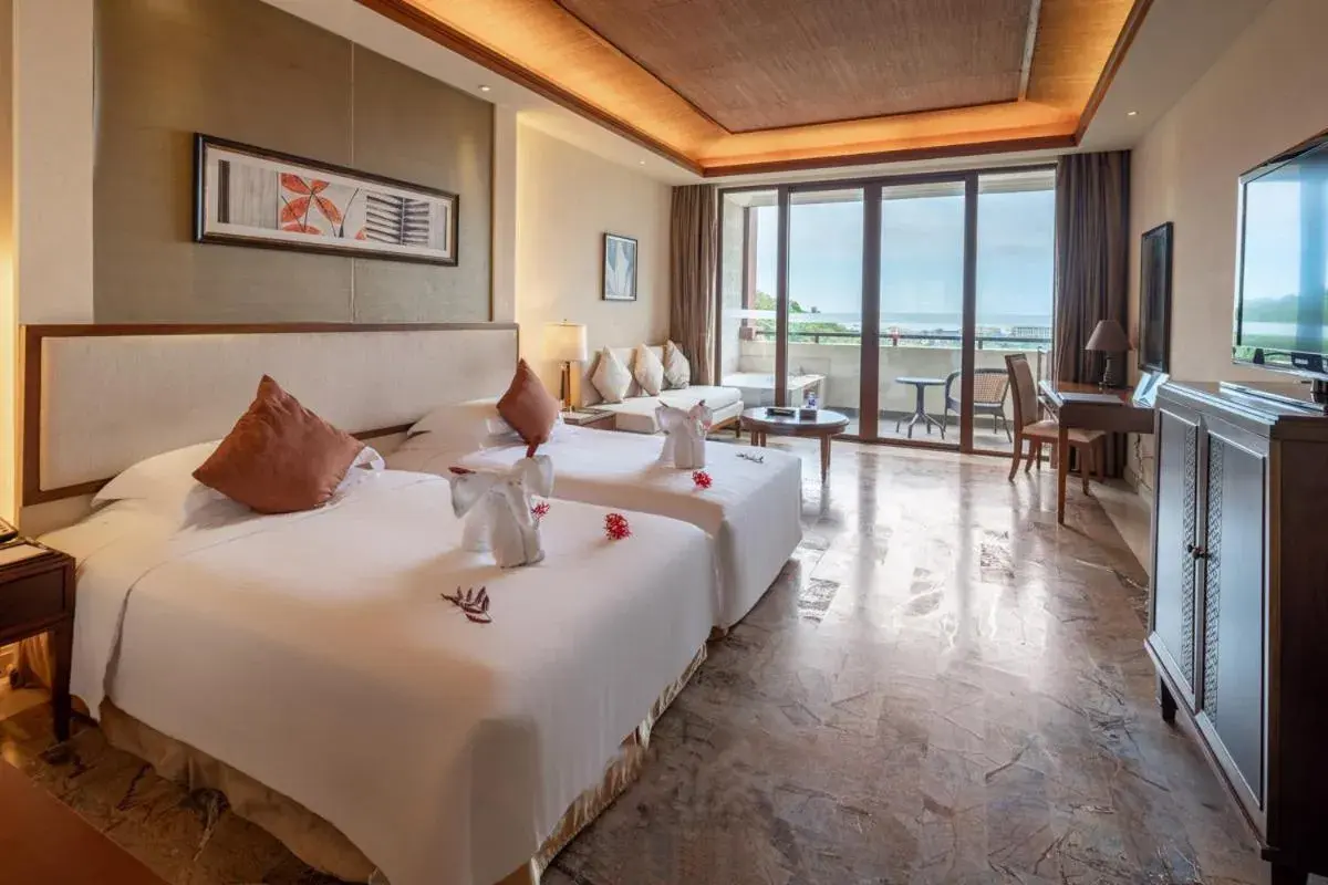 Double Room with Balcony and Sea View in Stony Brook Villa Jianguo Resort Sanya Double Room with Balcony and Sea View in Stony Brook Villa Jianguo Resort Sanya