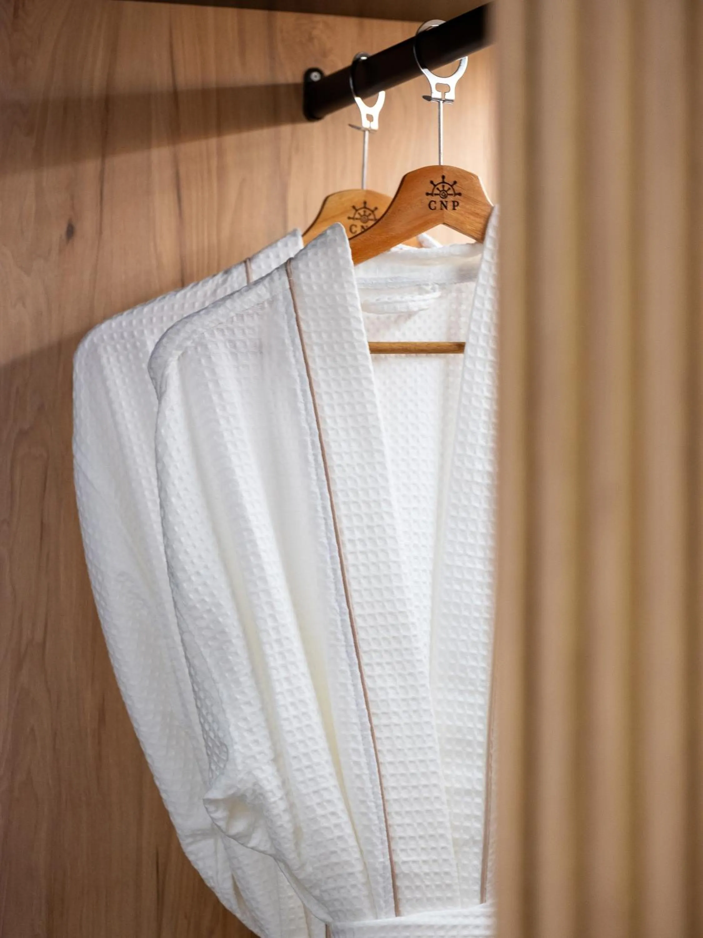 wardrobe in Captain Napoleon Paterakis CNP Luxurious Suites