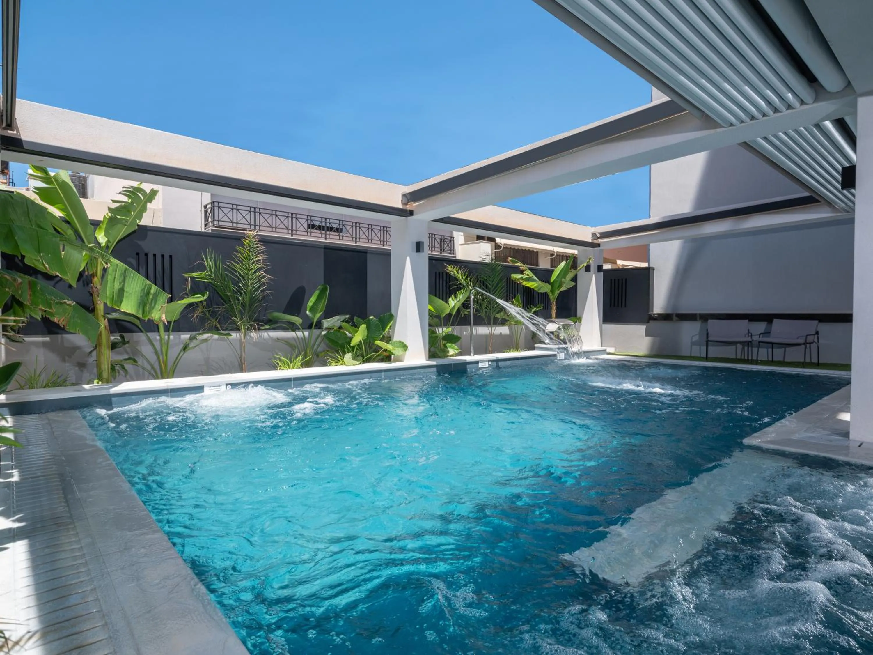 Swimming pool in Captain Napoleon Paterakis CNP Luxurious Suites