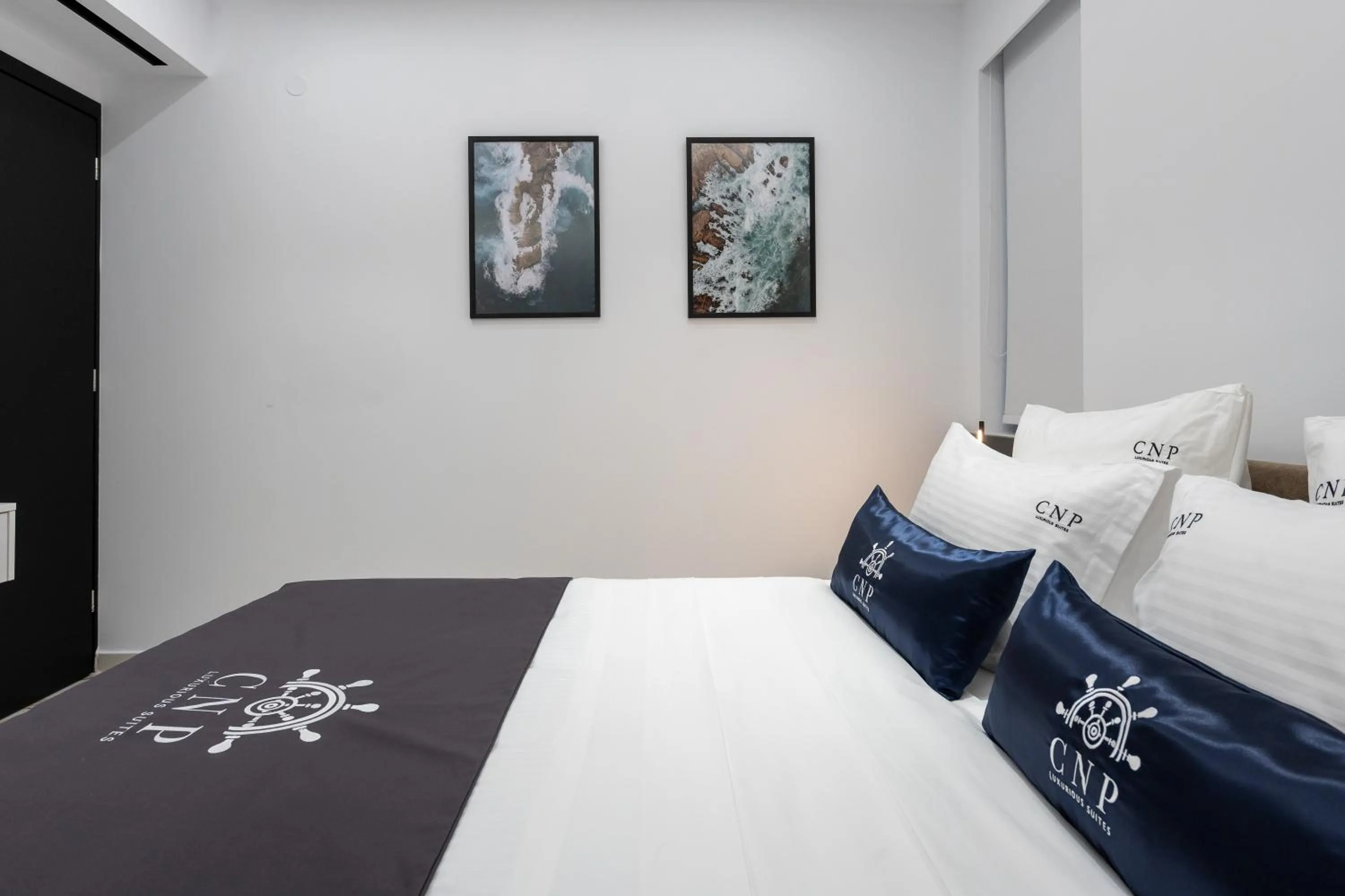 Bed in Captain Napoleon Paterakis CNP Luxurious Suites