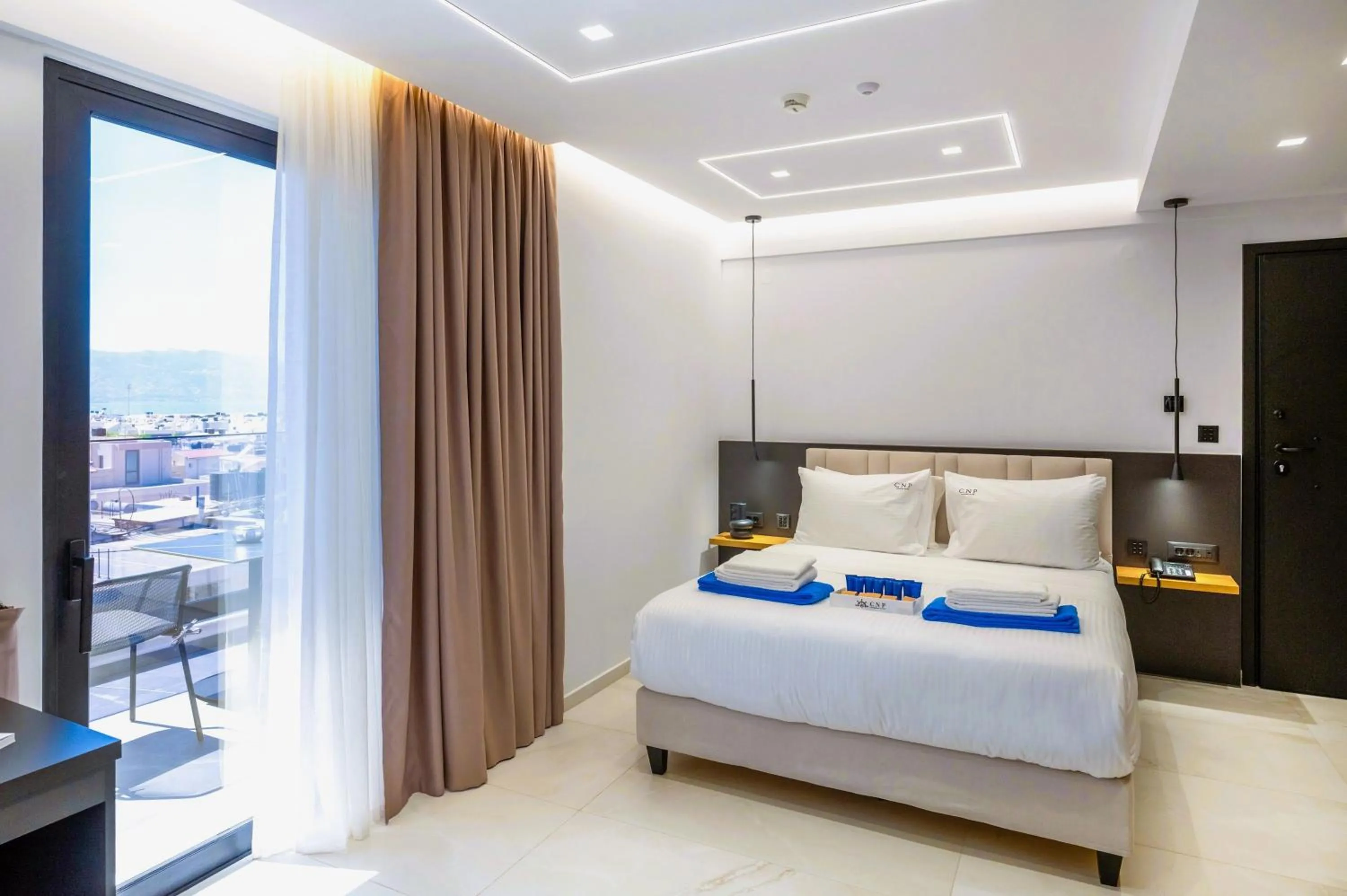 Bed in Captain Napoleon Paterakis CNP Luxurious Suites