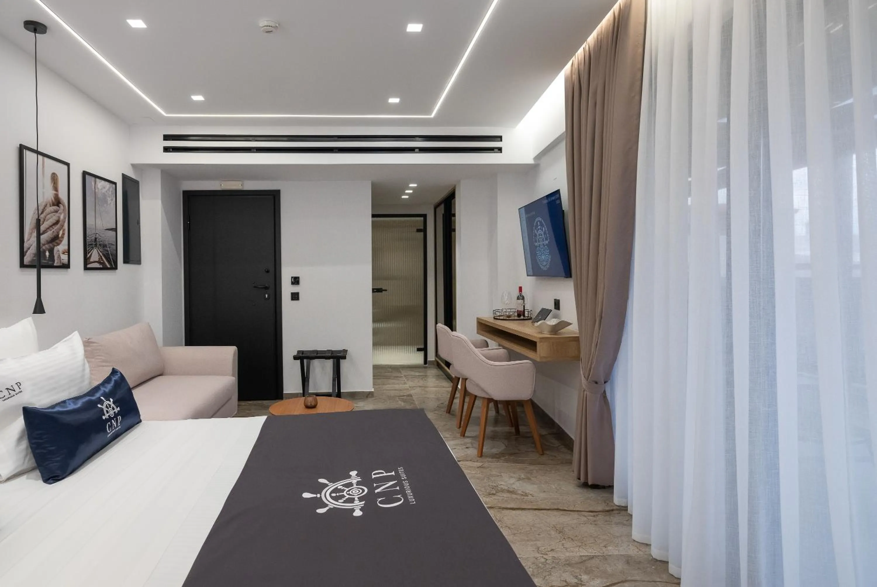 Bed in Captain Napoleon Paterakis CNP Luxurious Suites