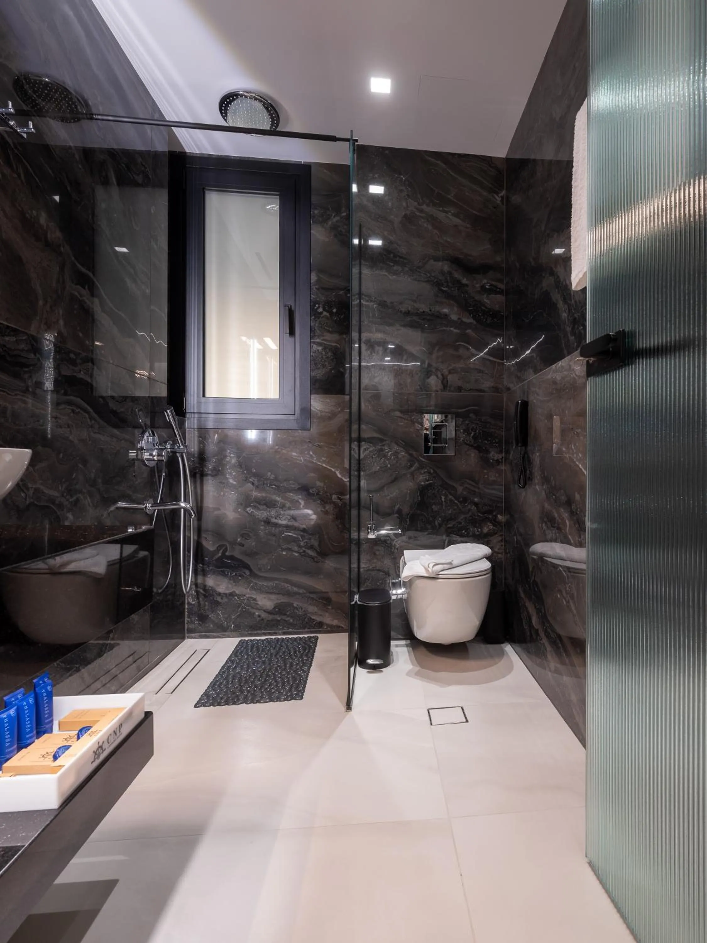 Shower in Captain Napoleon Paterakis CNP Luxurious Suites
