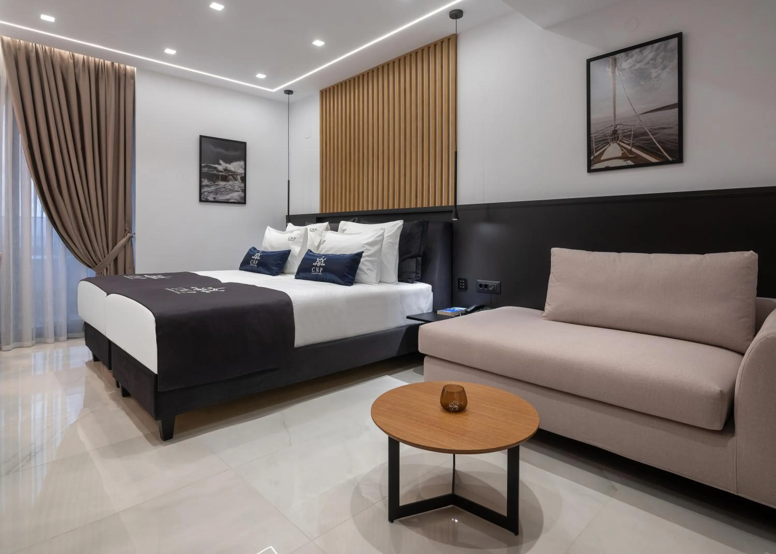 Bed in Captain Napoleon Paterakis CNP Luxurious Suites