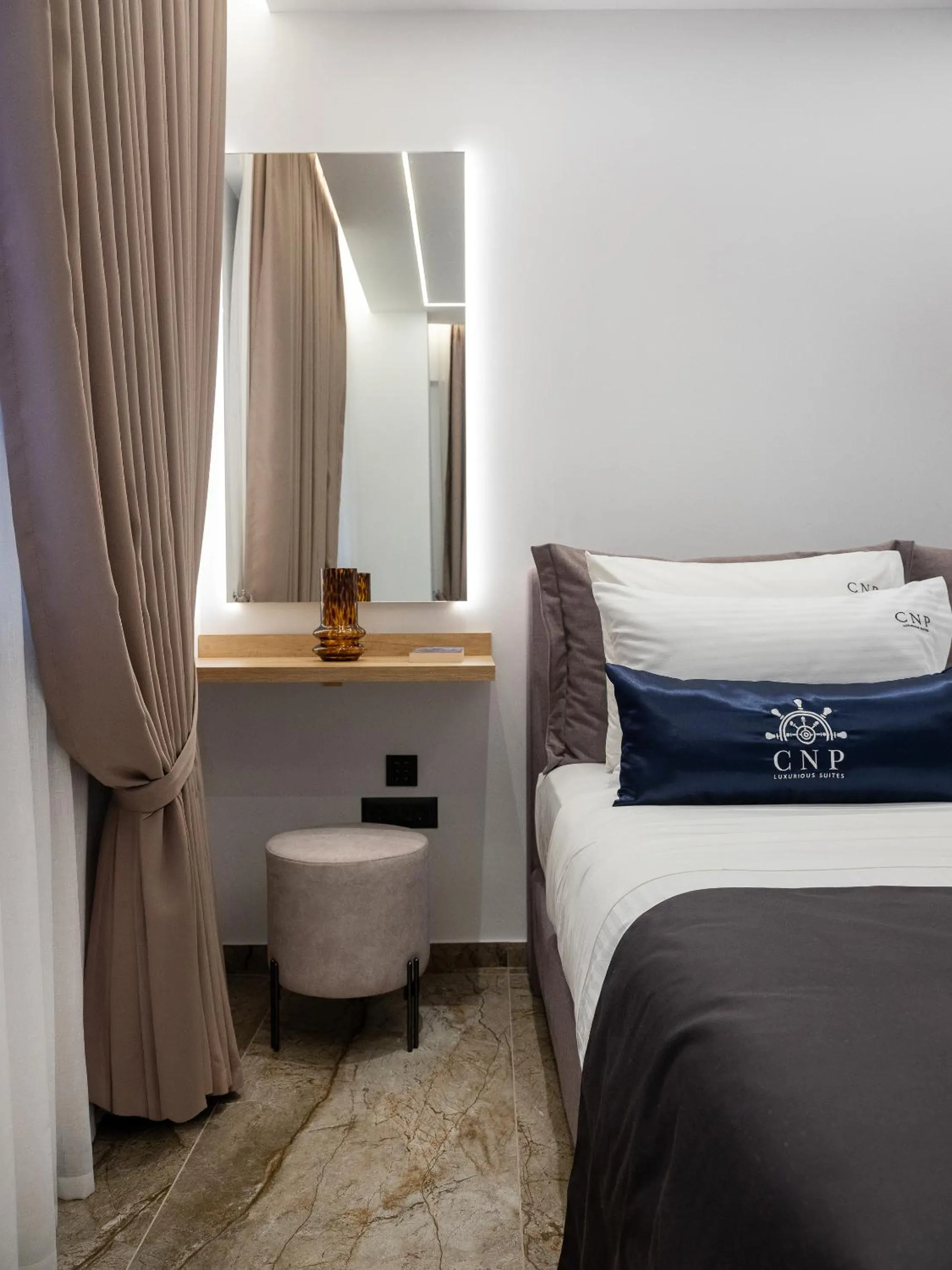 Bed in Captain Napoleon Paterakis CNP Luxurious Suites