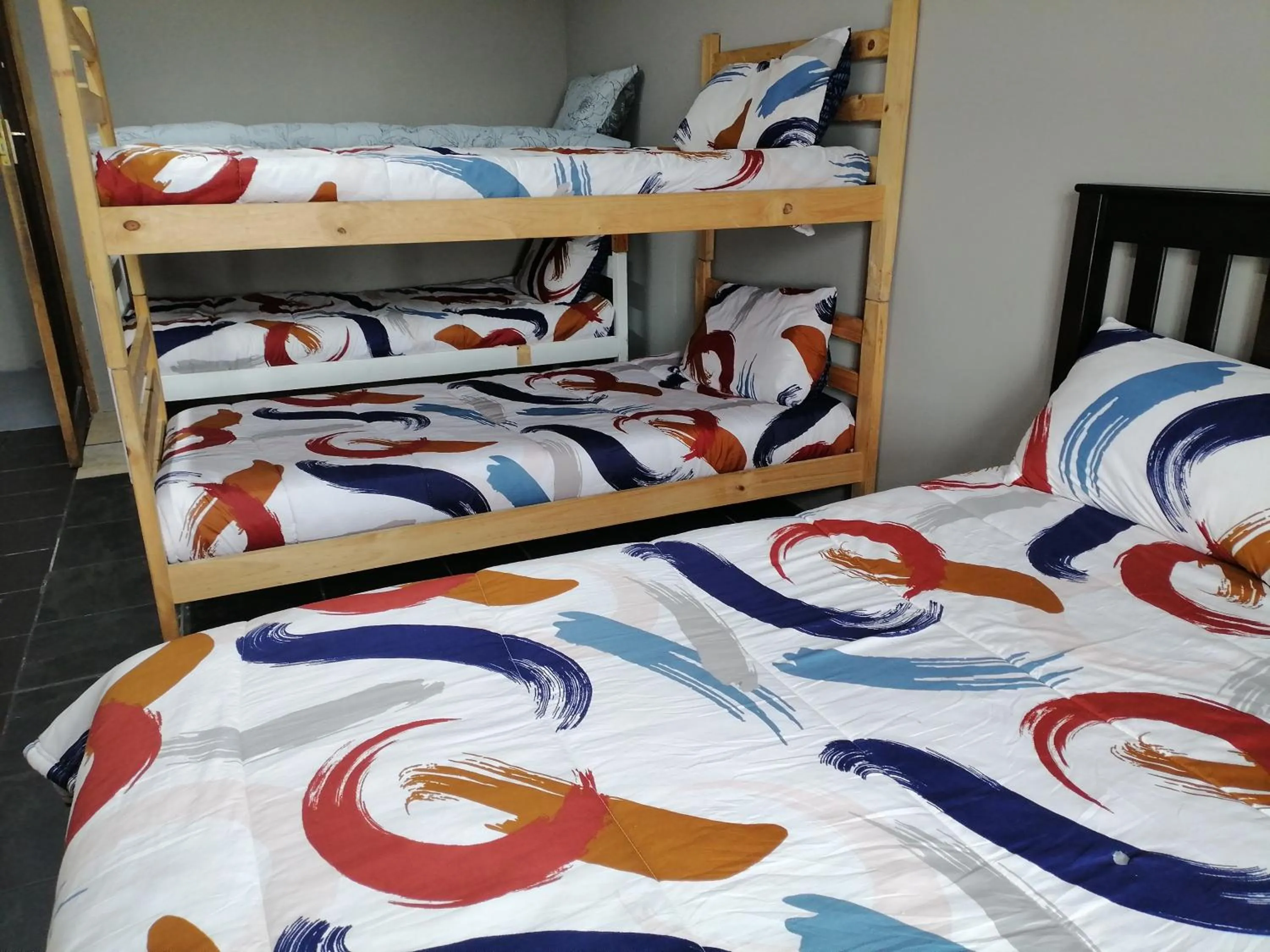 Bed in Mile Crunchers Backpackers & Hostelling