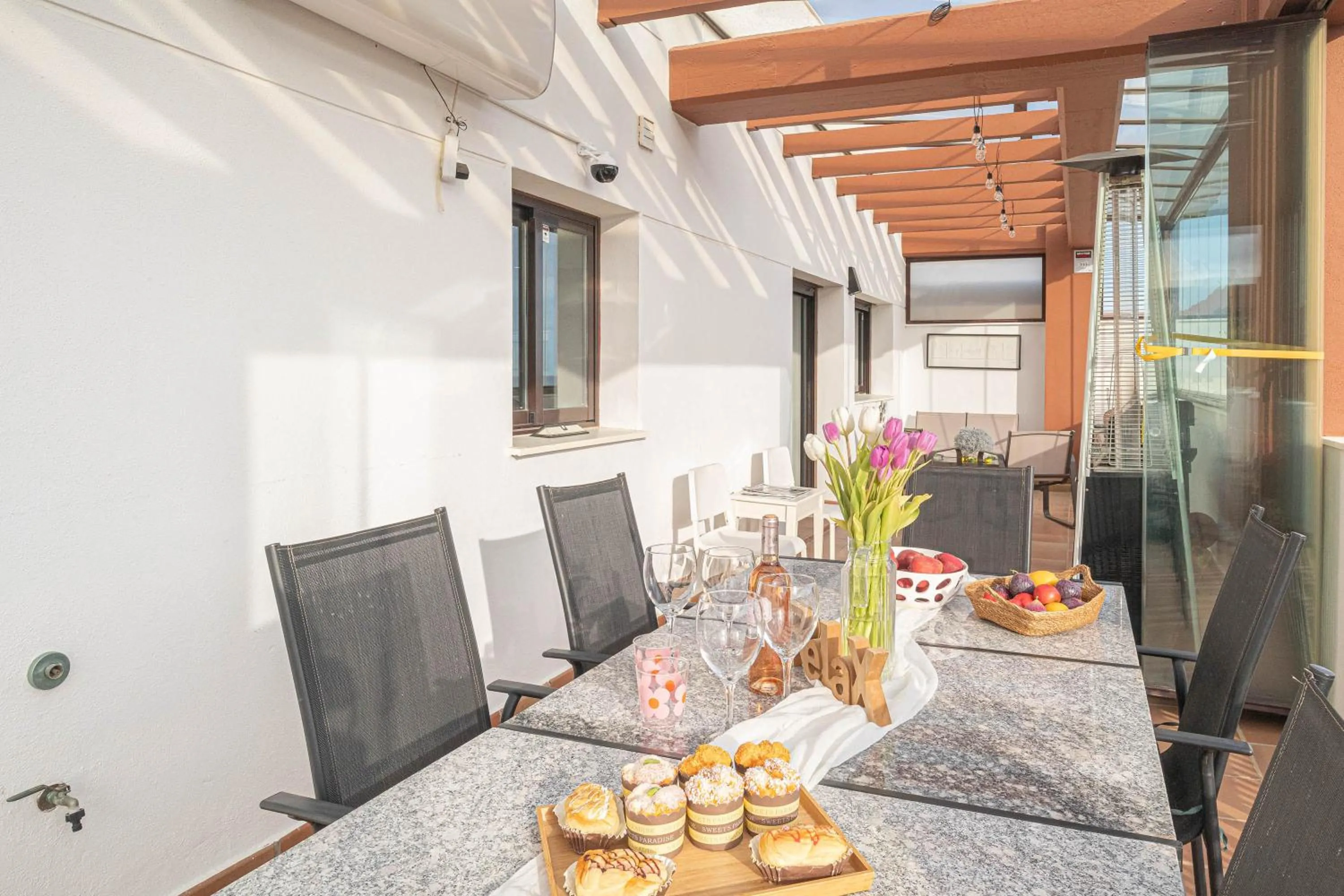 Dining area in Luxury Cala Blanca Walking To Beach - Happy Rentals