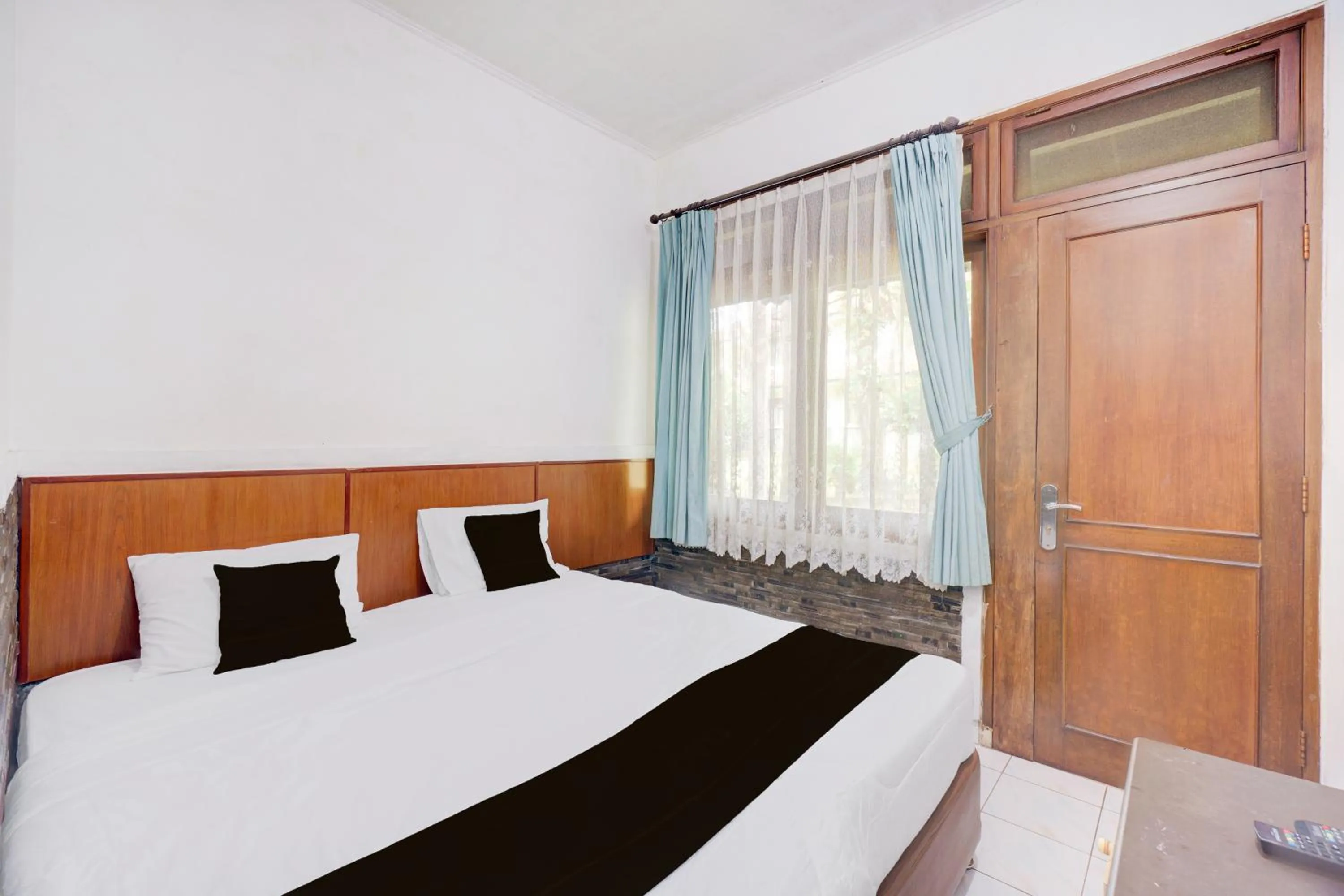 Photo of the whole room, Bed in Hotel O Bogor near Taman Safari formerly Hotel Rudian 1