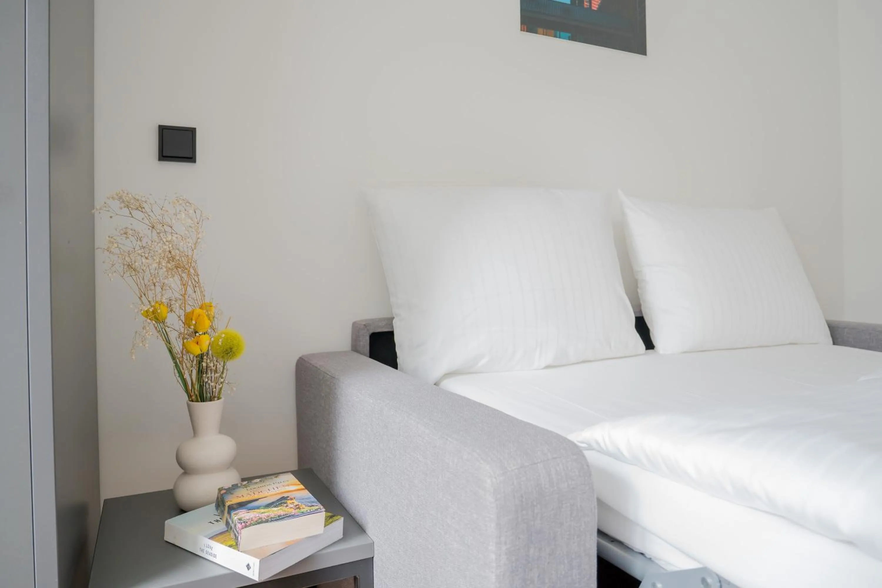 Bed in Homaris Apartments Nibelungen