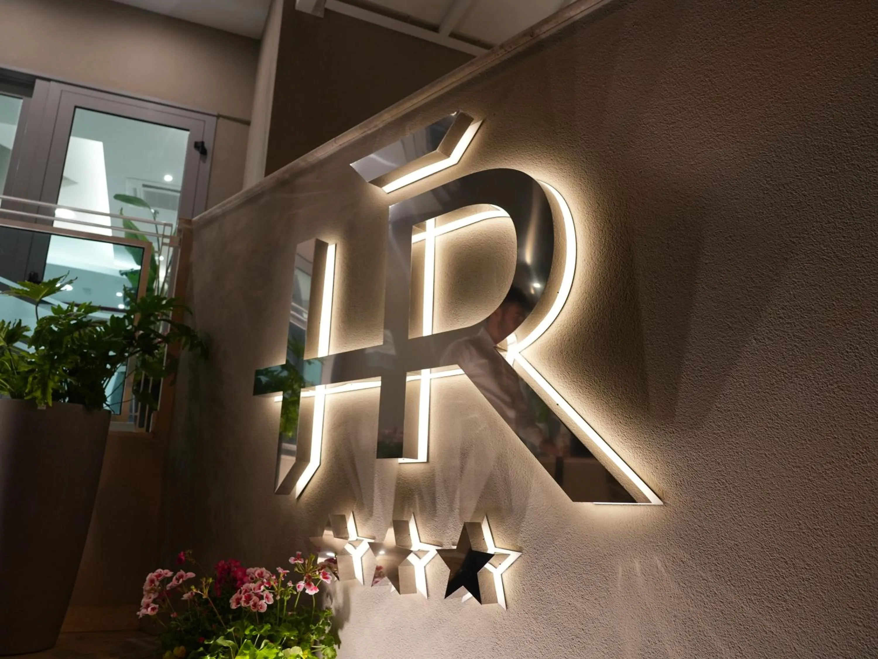 Property logo or sign in Hotel Regal