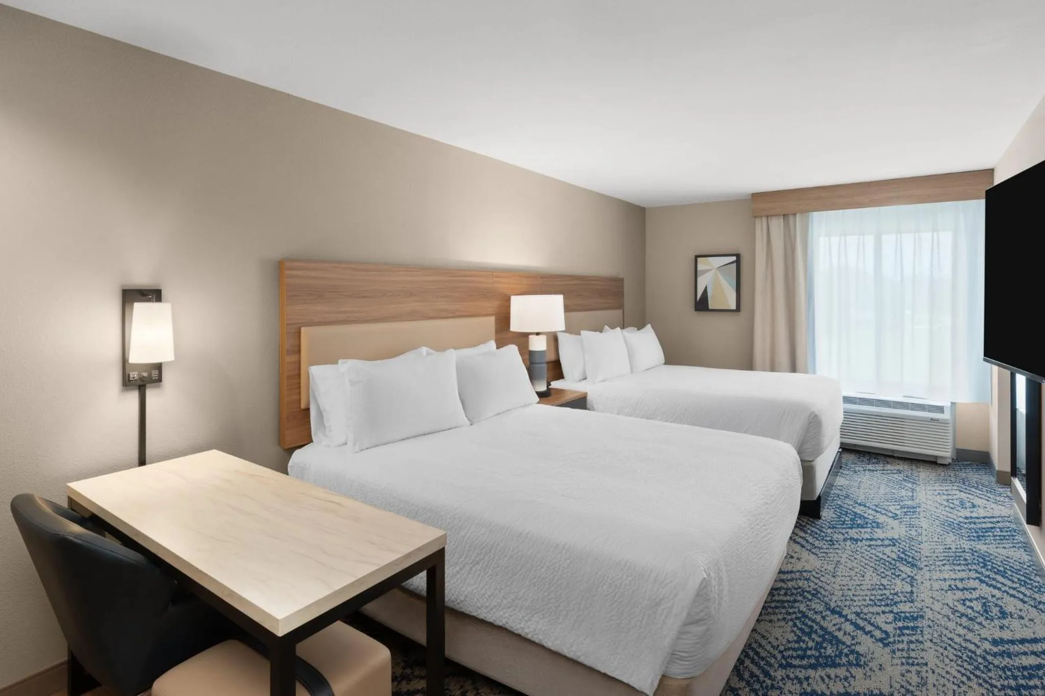 Photo of the whole room, Bed in Candlewood Suites Huntsville - Research Park by IHG