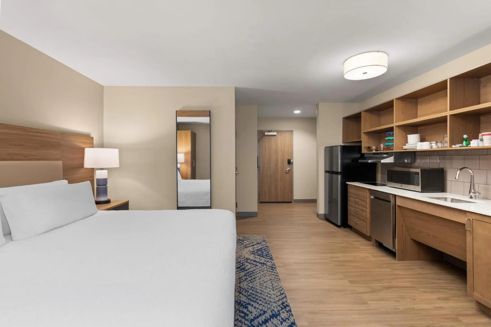 Photo of the whole room, Bed in Candlewood Suites Huntsville - Research Park by IHG