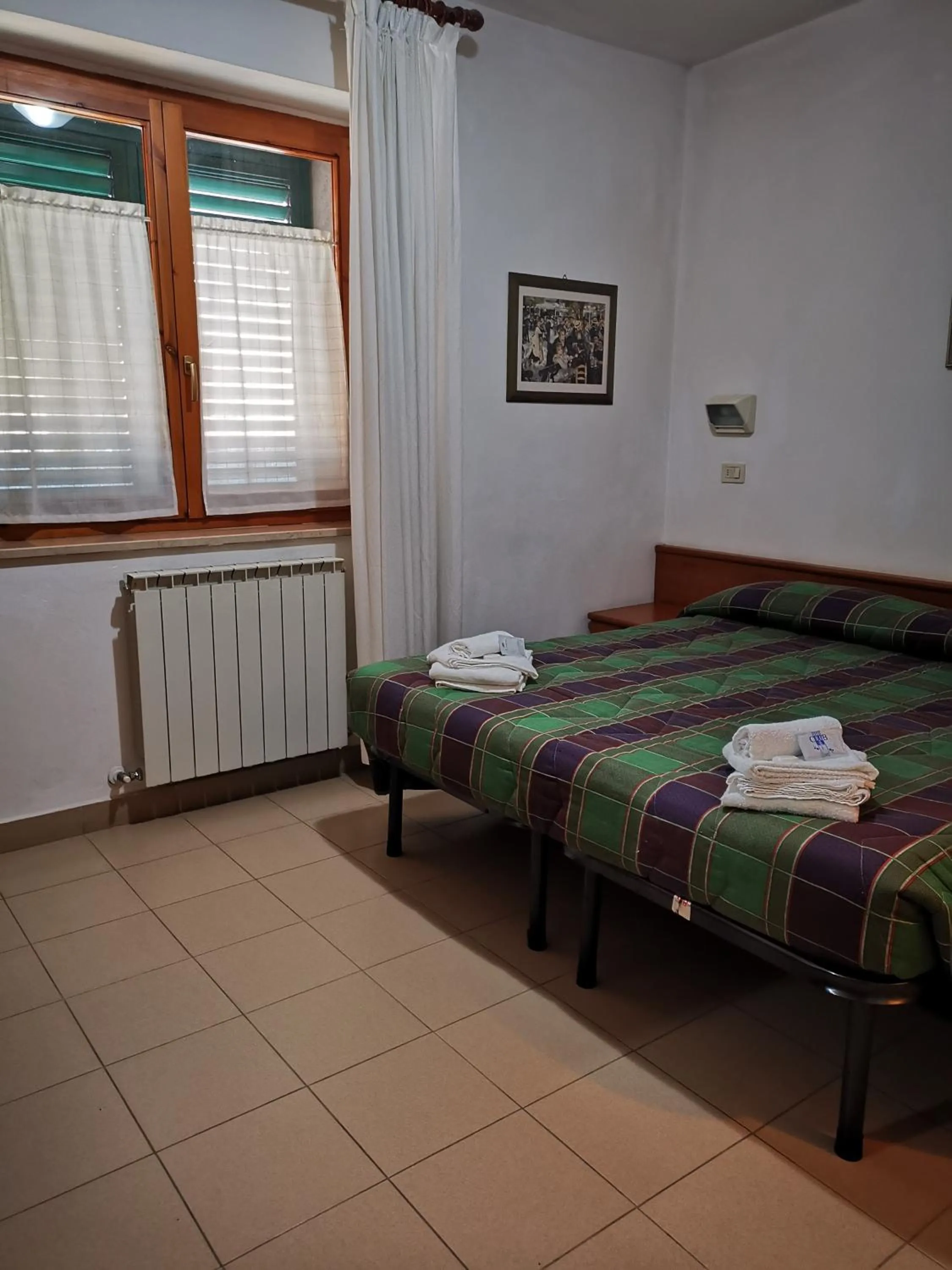 Bedroom in Osteria dei Locandieri