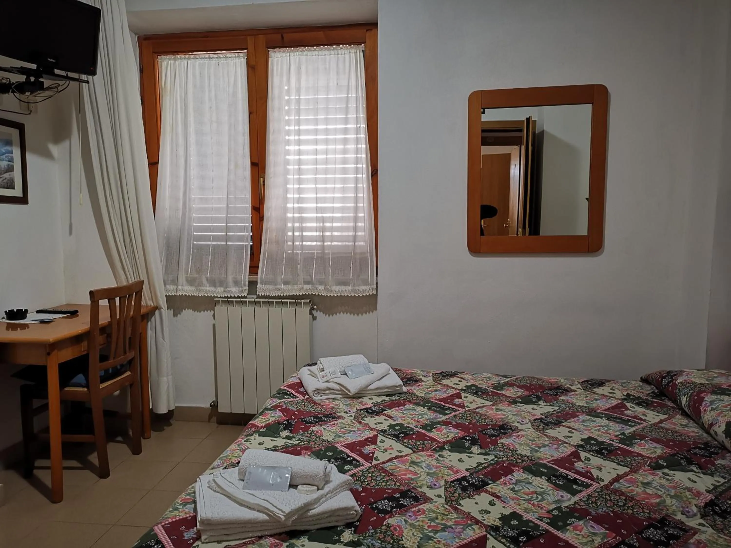 Bedroom in Osteria dei Locandieri