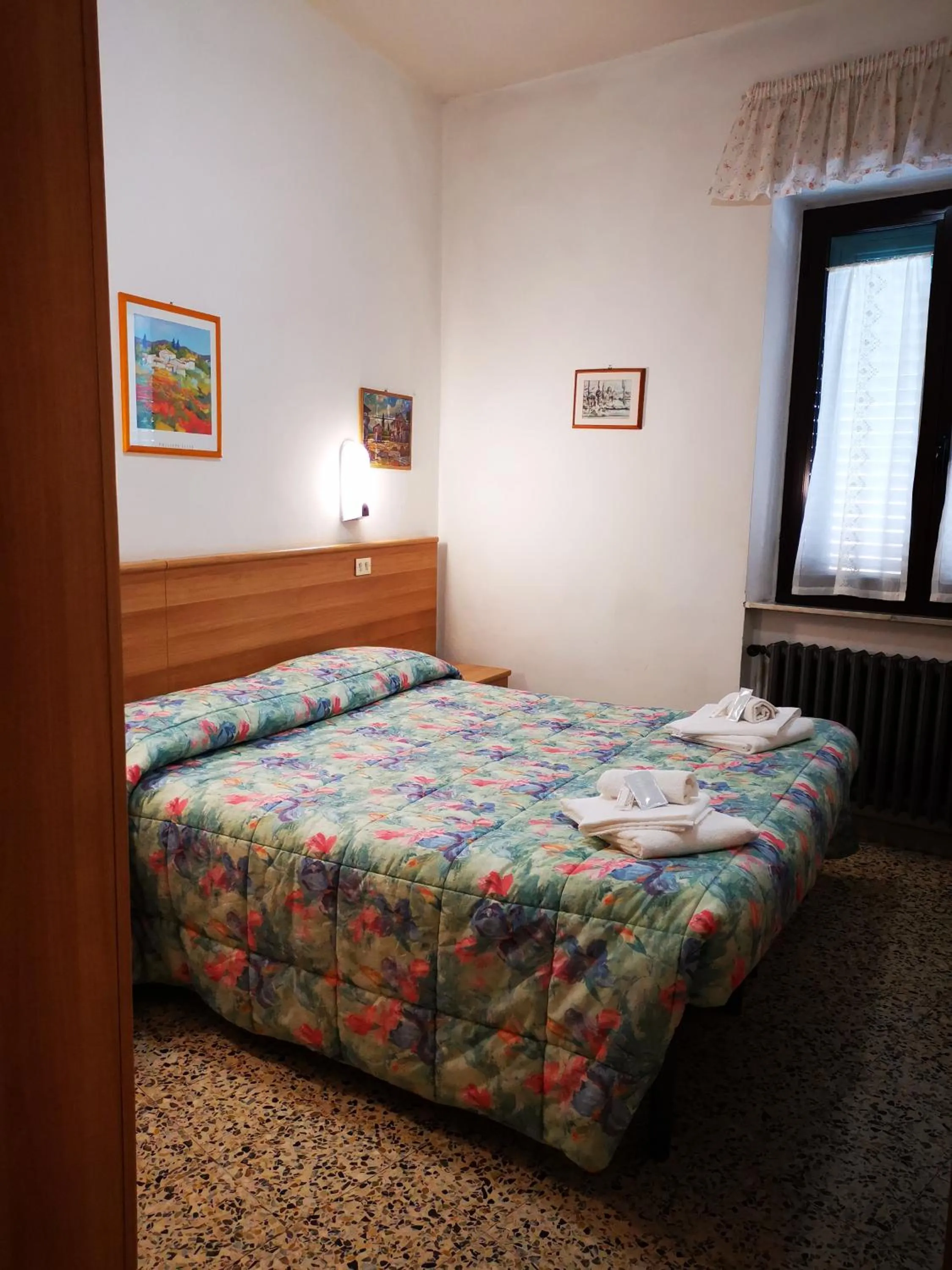 Bedroom in Osteria dei Locandieri