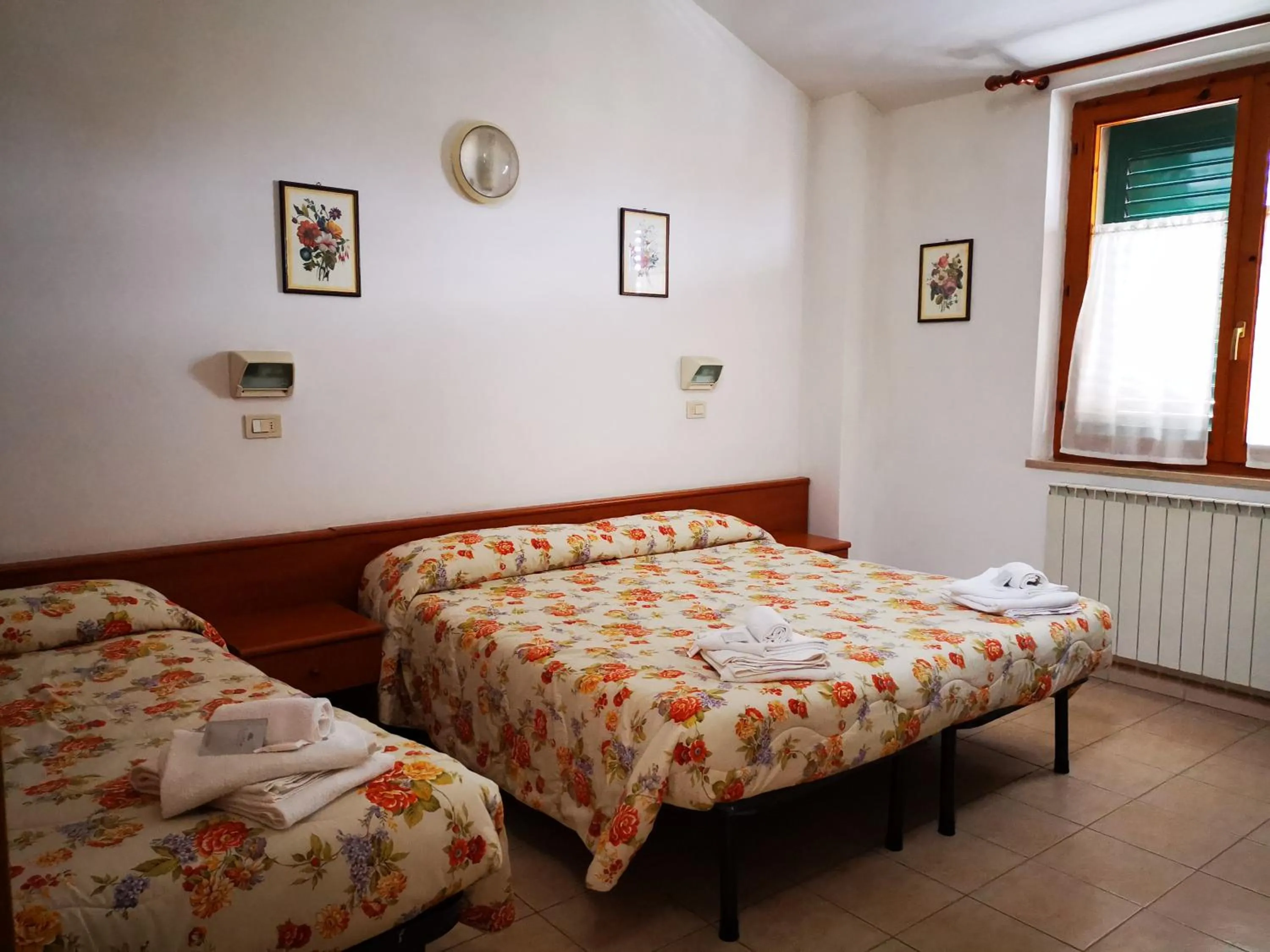 Bedroom in Osteria dei Locandieri