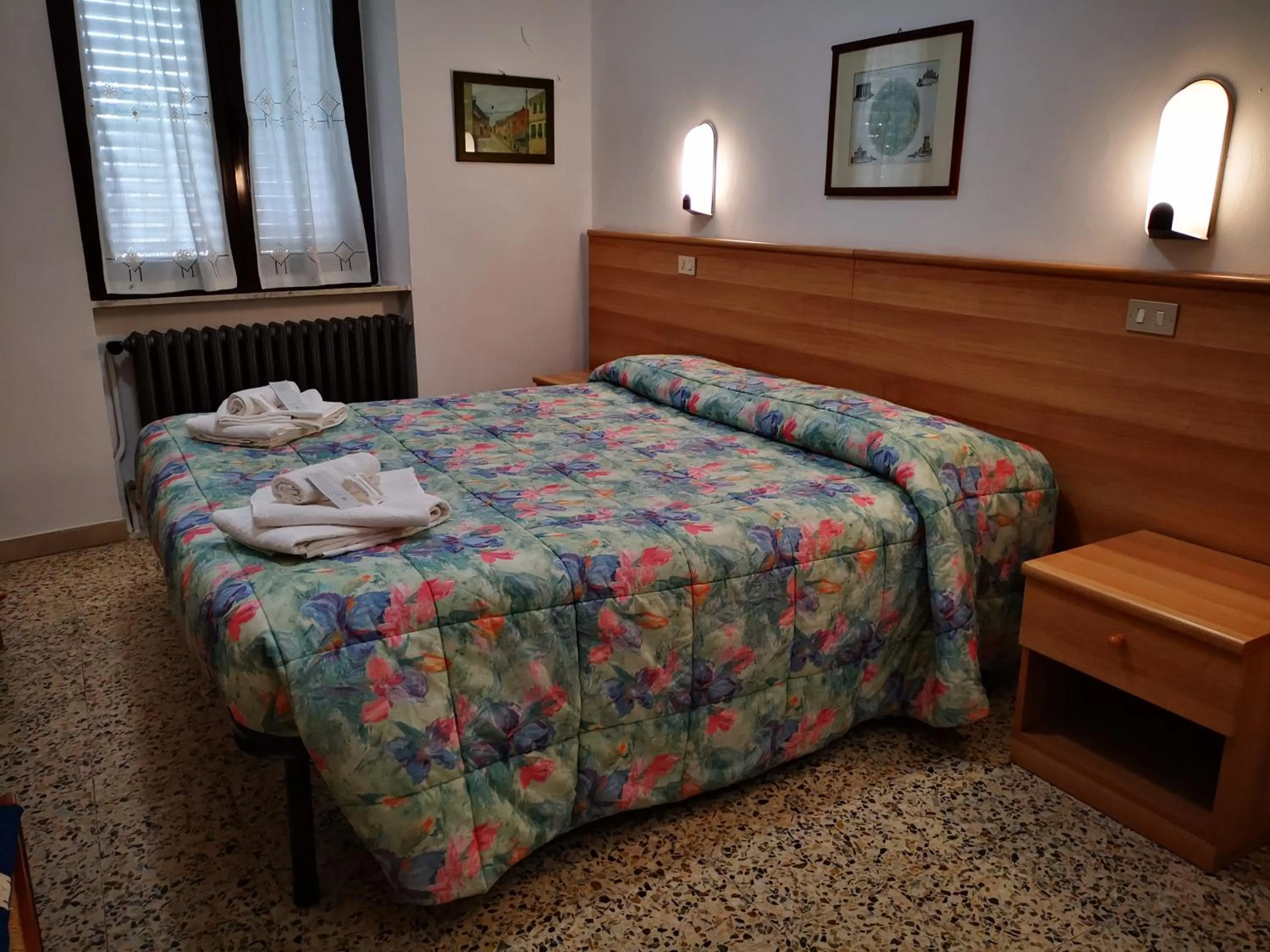 Bedroom in Osteria dei Locandieri