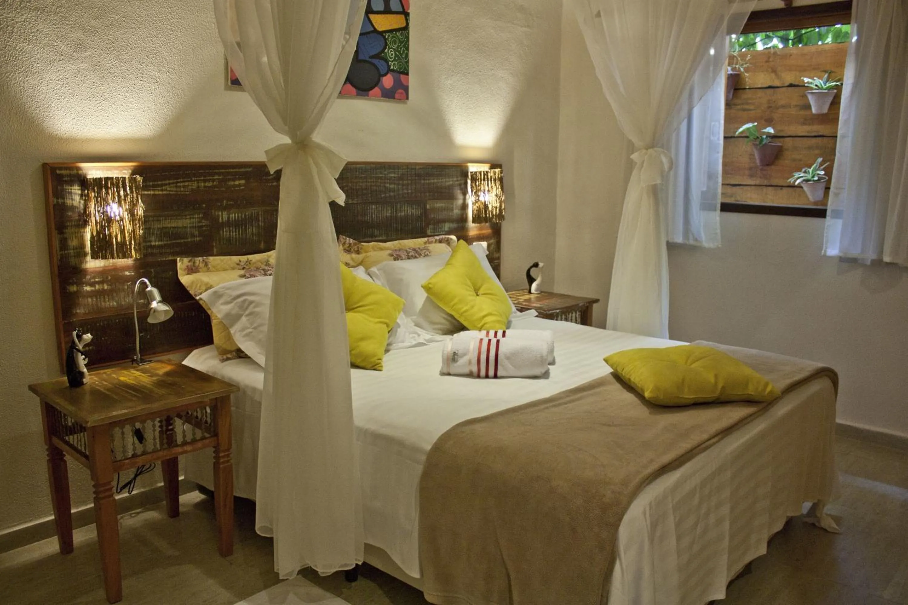 Bed in Pousada de Charme Emirados