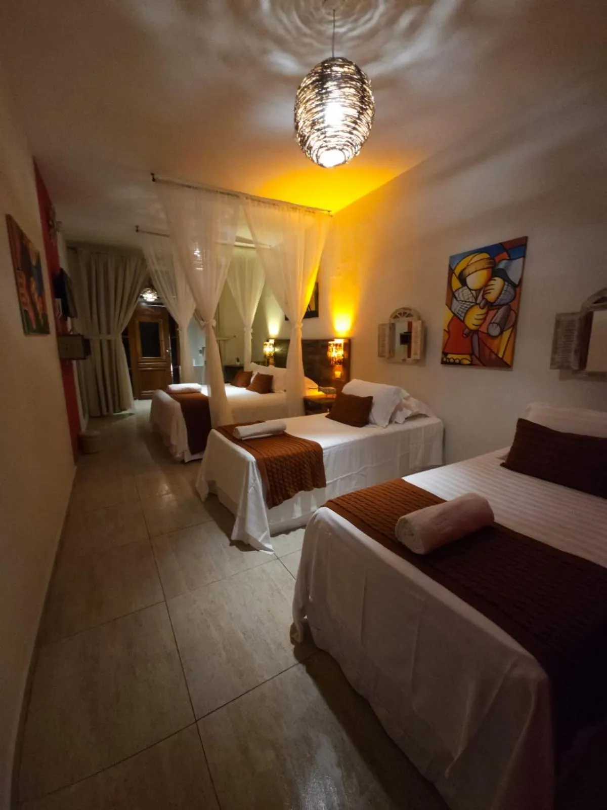 Bed in Pousada de Charme Emirados