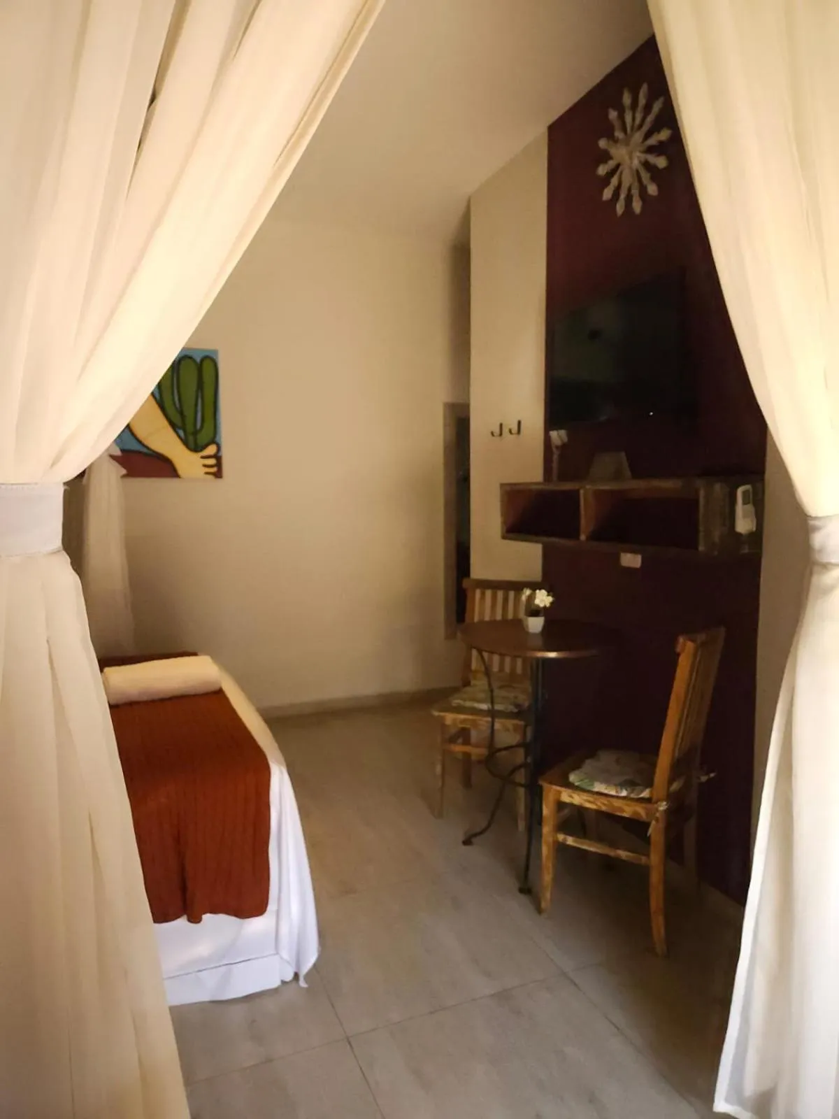 Bed in Pousada de Charme Emirados